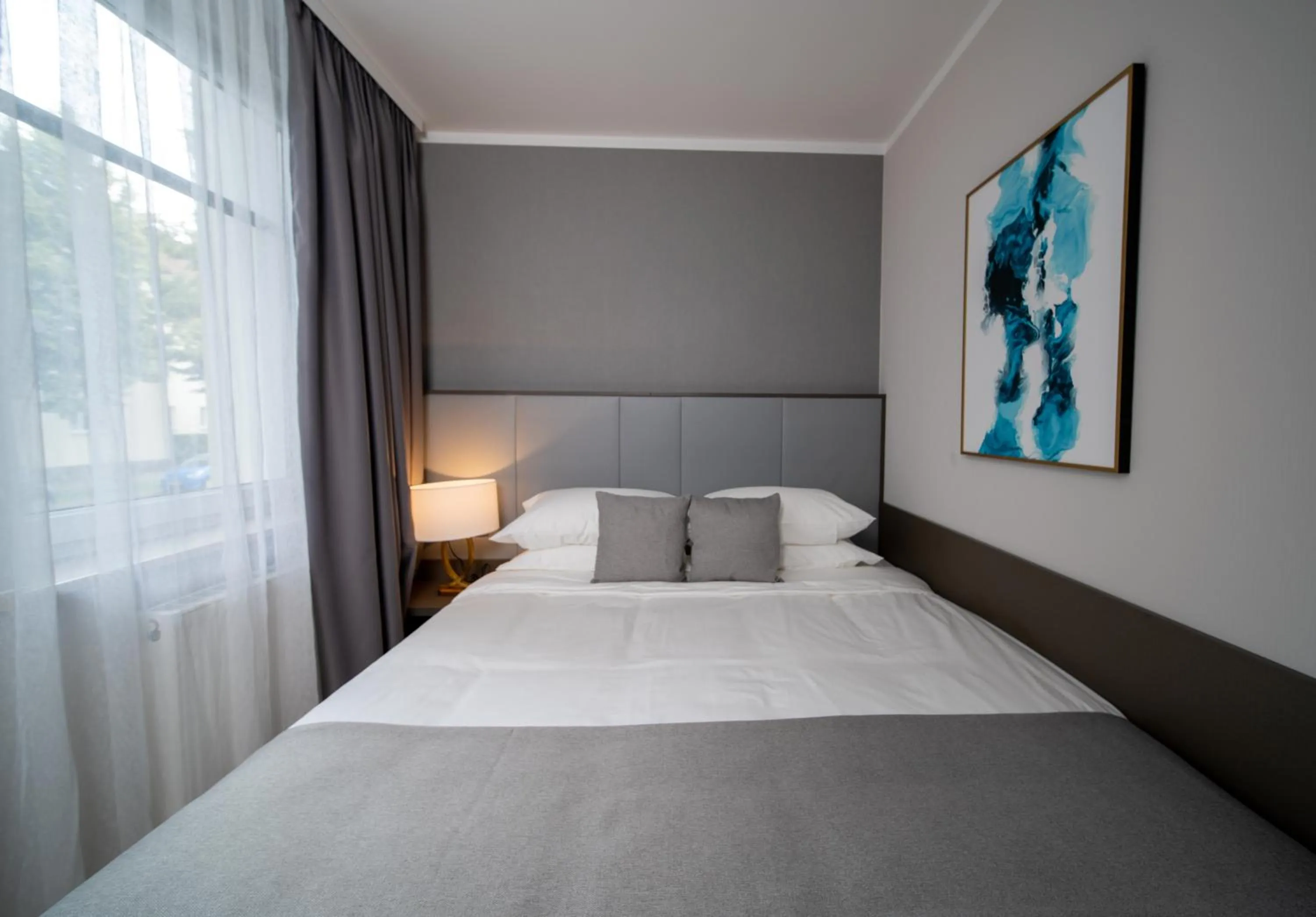 Bed in Emily Hotel Leipzig Neue Messe