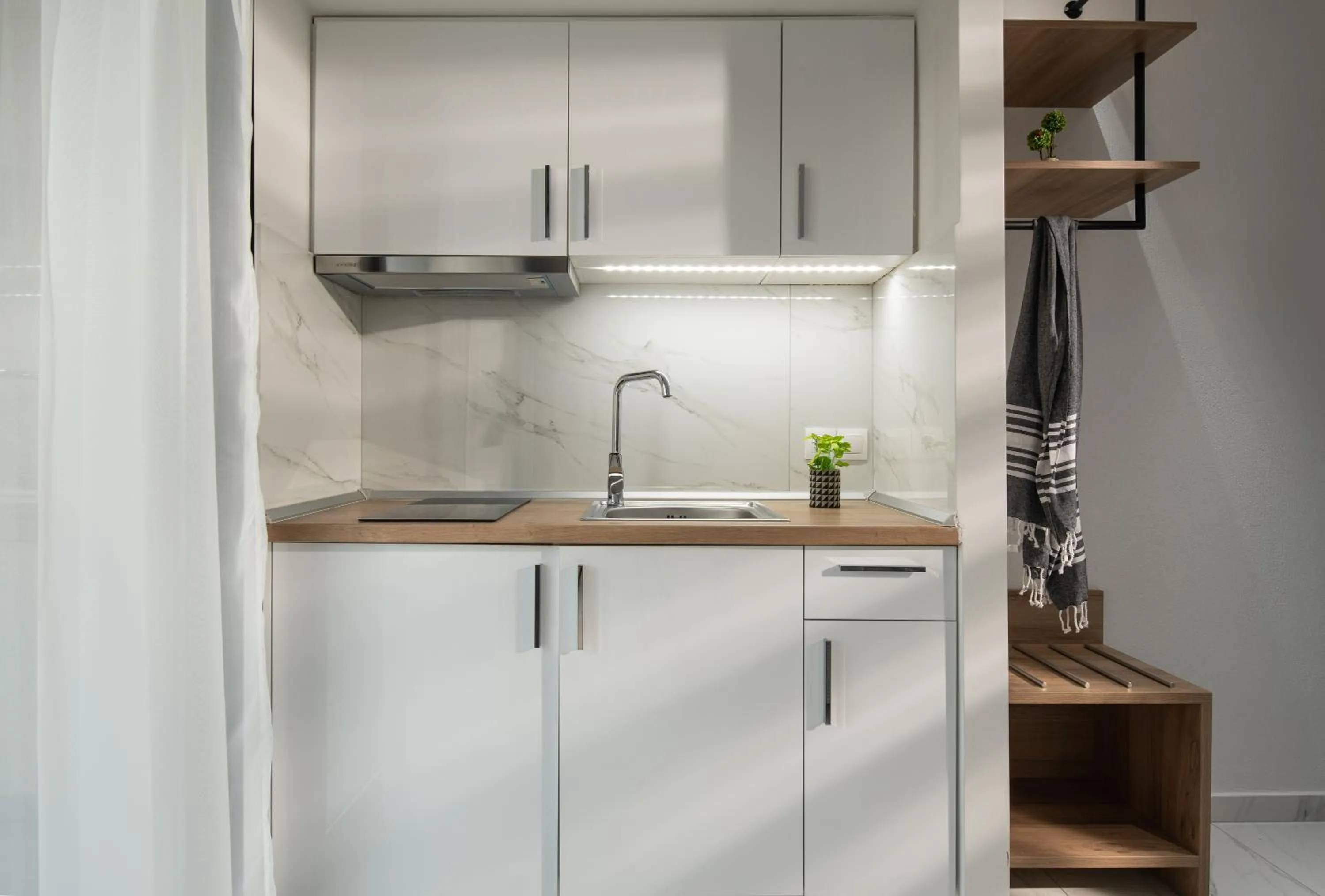 Kitchen or kitchenette in San Giorgio Apartments Nikiti