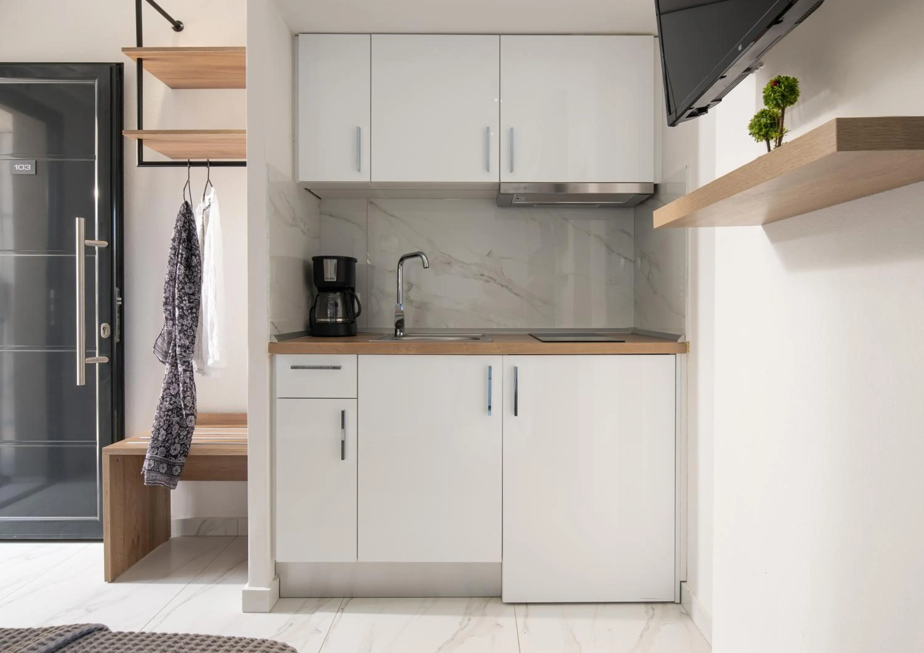 Kitchen or kitchenette in San Giorgio Apartments Nikiti