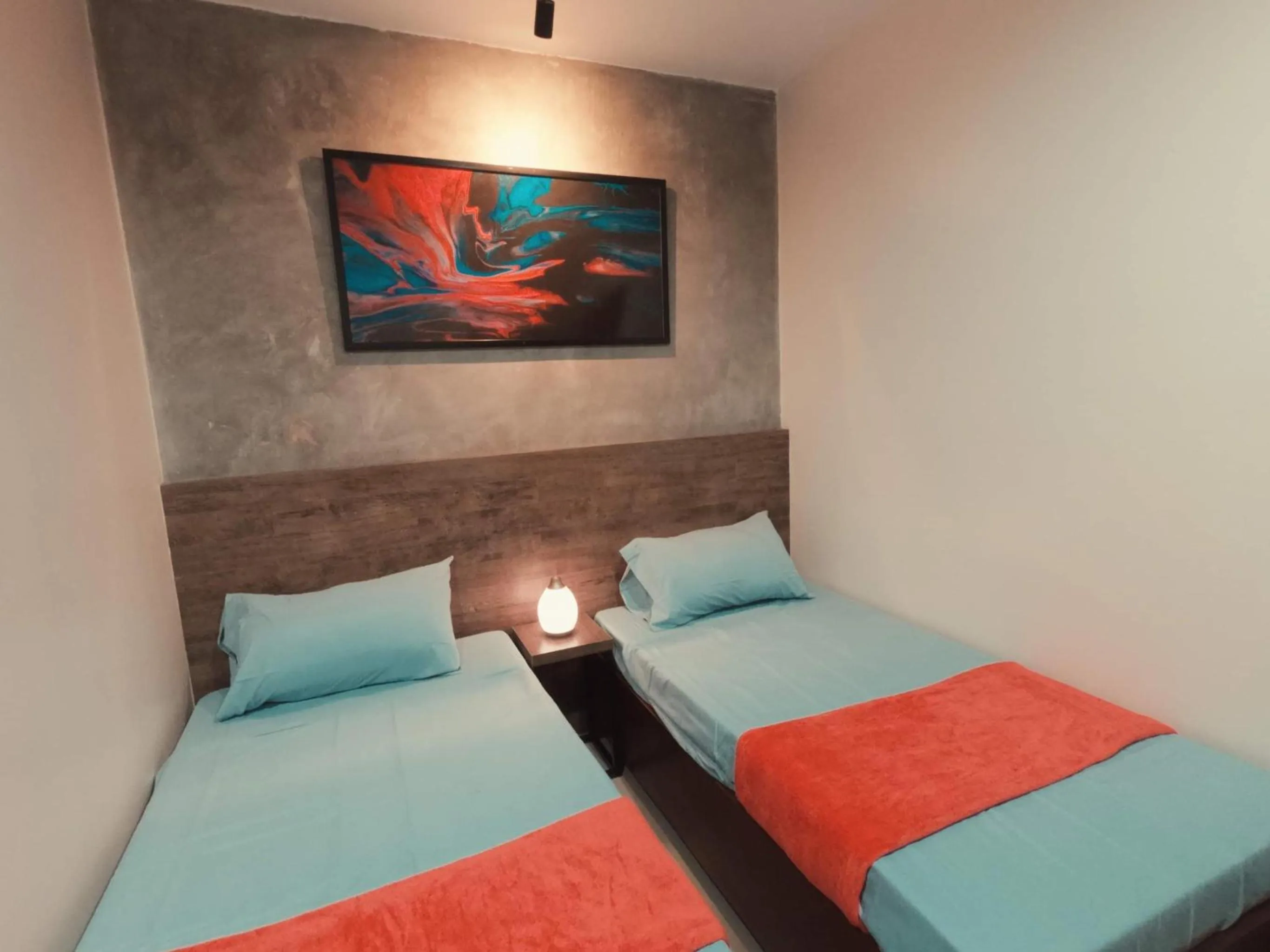 Photo of the whole room, Bed in A&E Apartelle