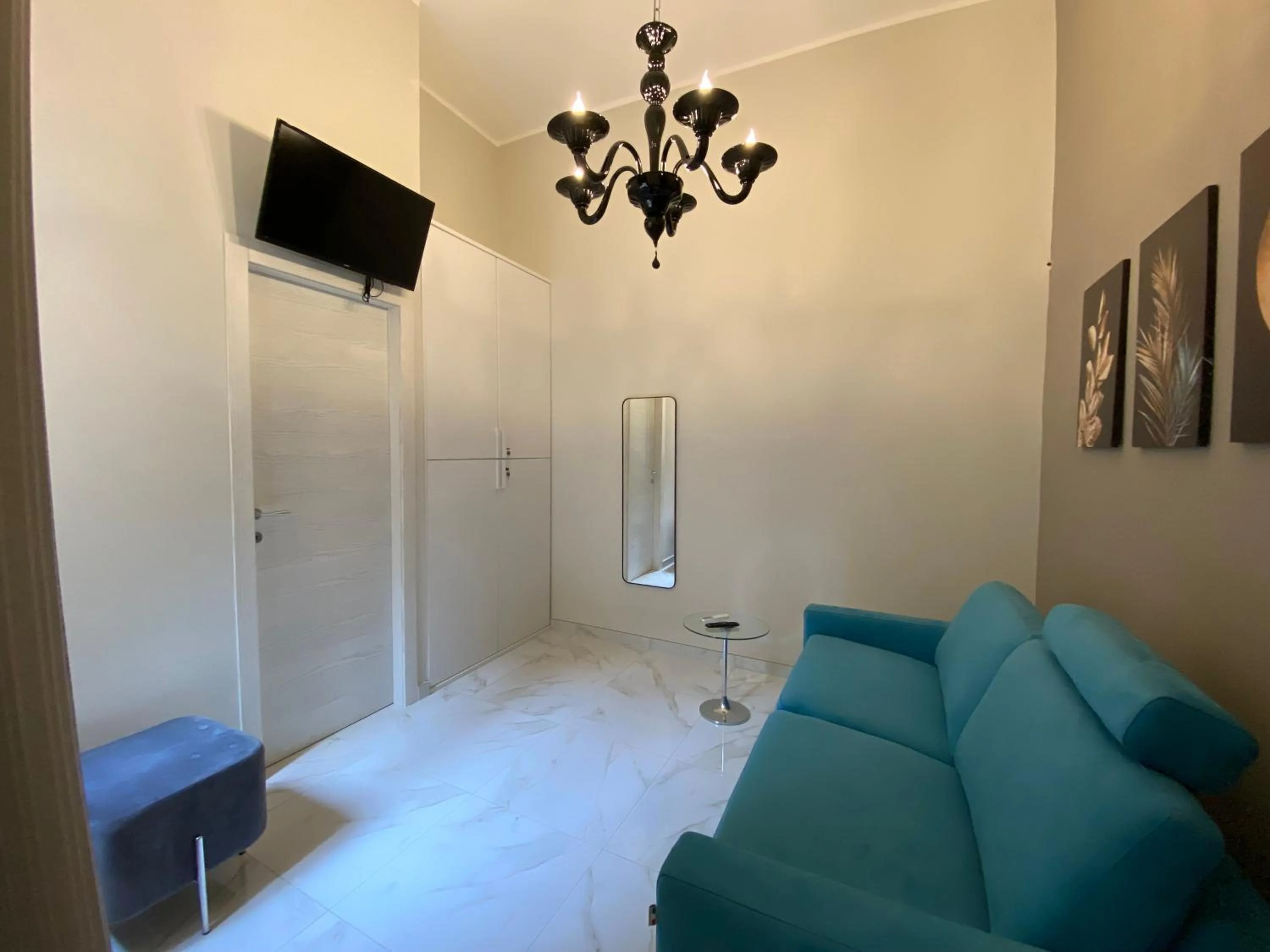 Communal lounge/ TV room in La Fitolacca B&B