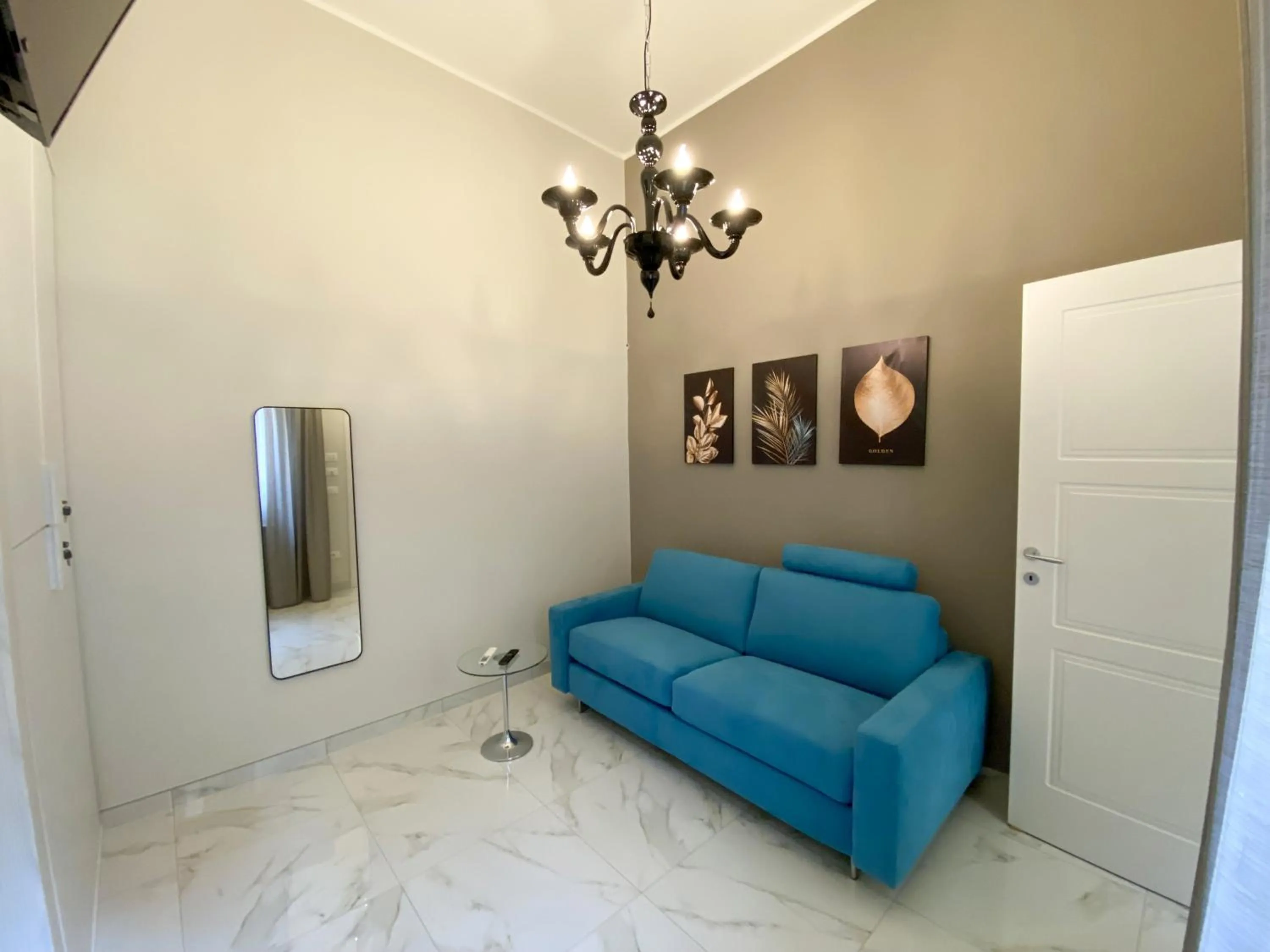 Communal lounge/ TV room in La Fitolacca B&B