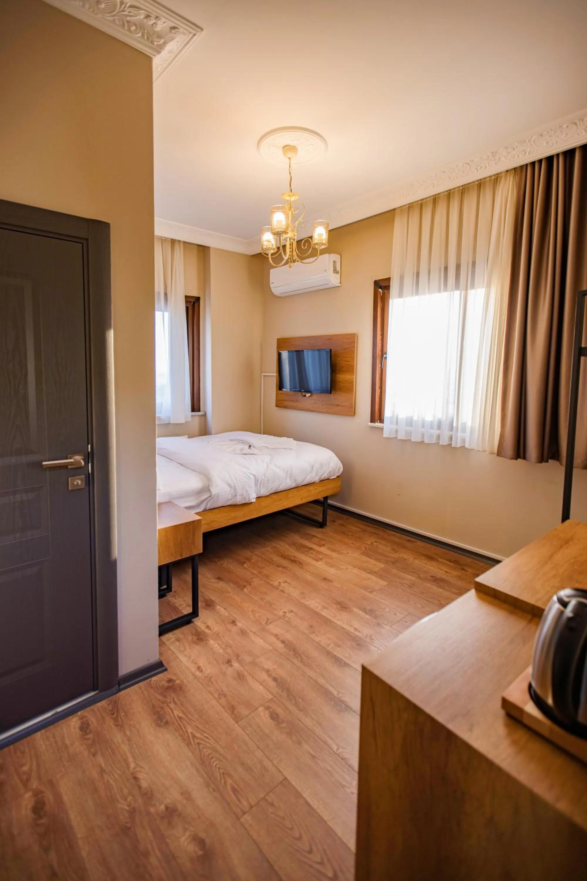 Bed in Grand Balyan Hotel & Restaurant