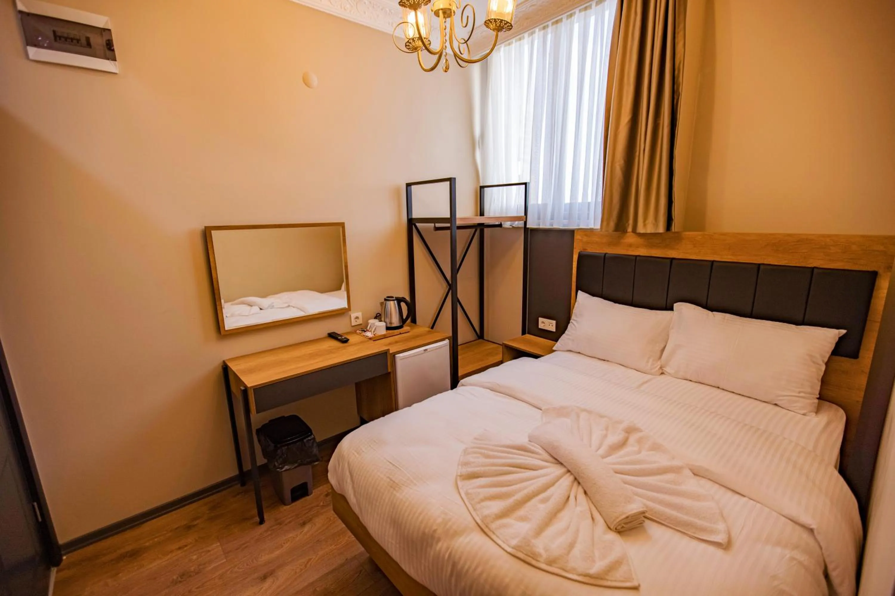 Bed in Grand Balyan Hotel & Restaurant