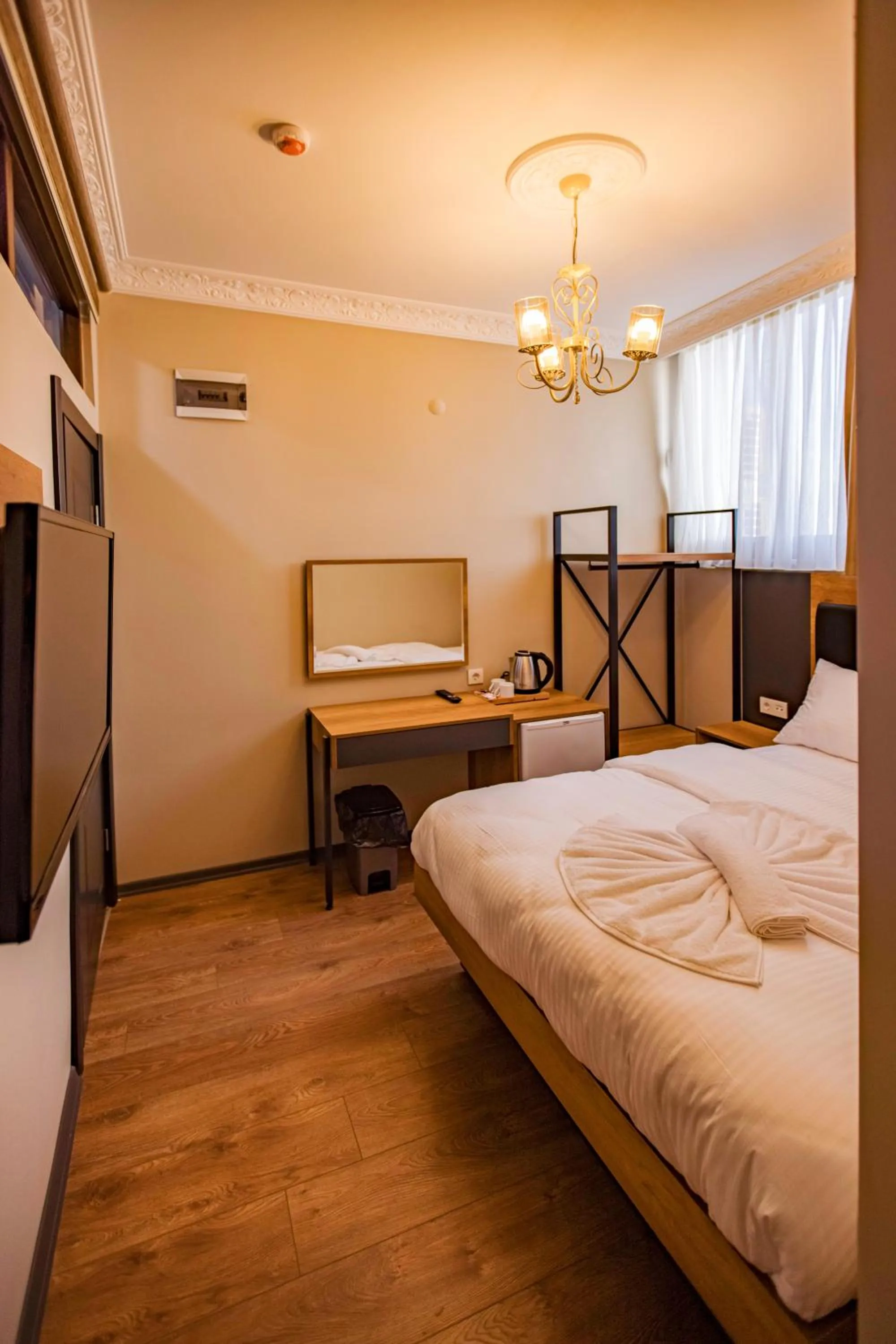 Bed in Grand Balyan Hotel & Restaurant