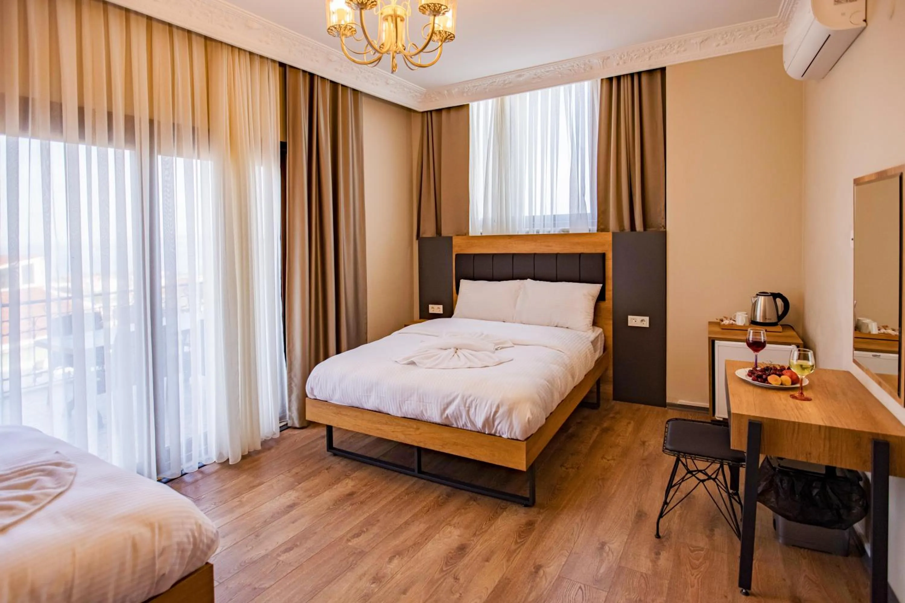 Bed in Grand Balyan Hotel & Restaurant