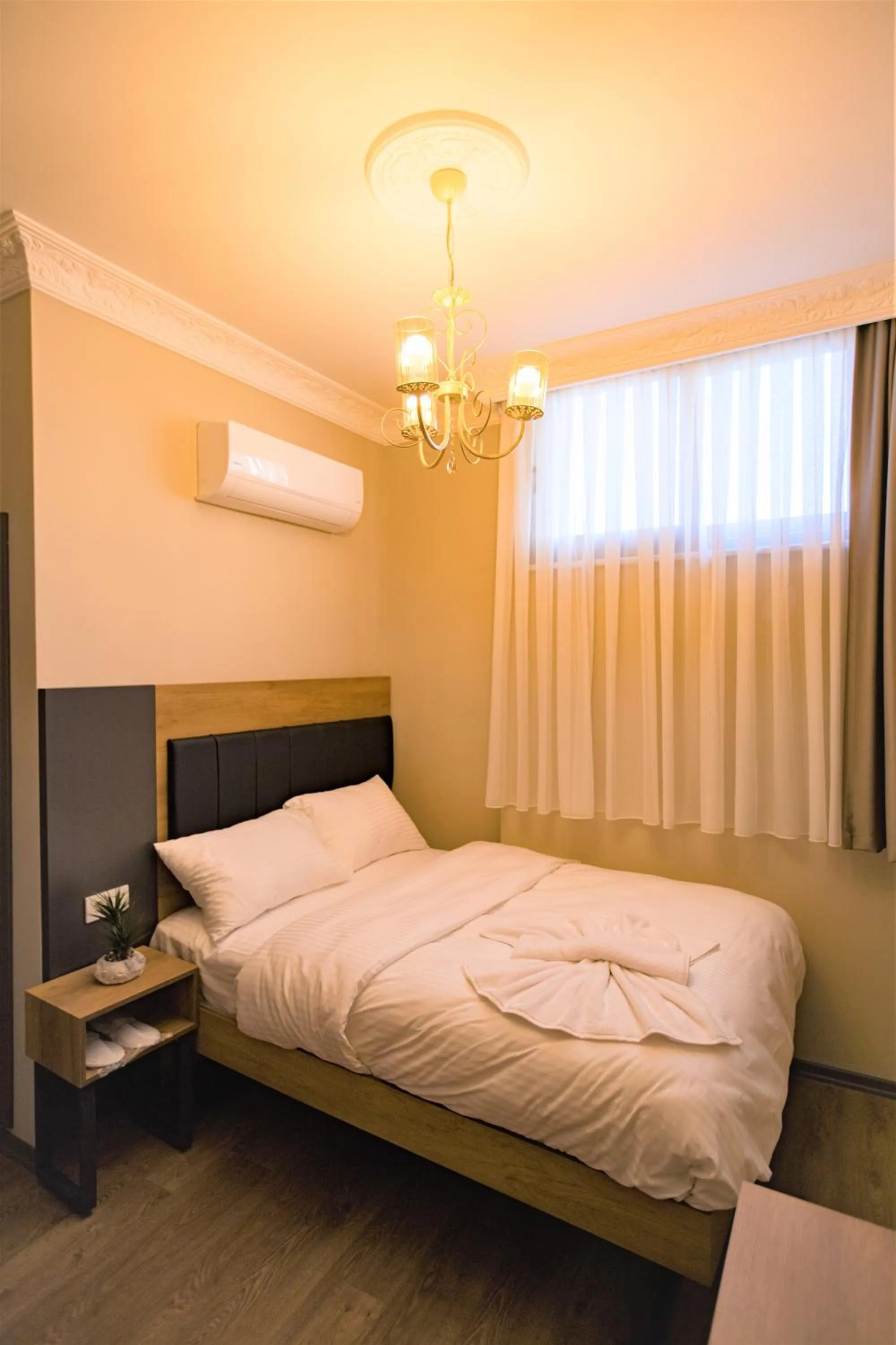 Bed in Grand Balyan Hotel & Restaurant