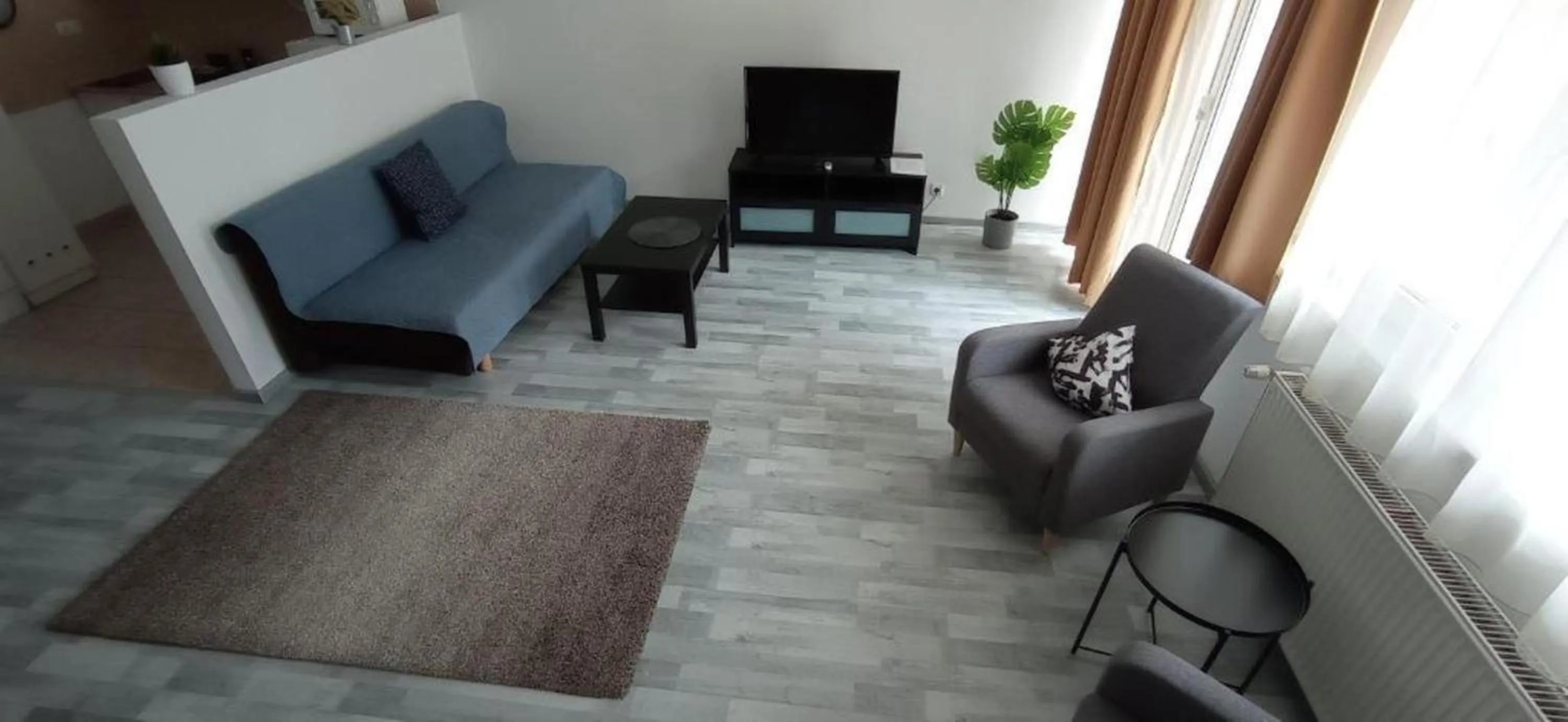 Communal lounge/ TV room in Agape Apartments