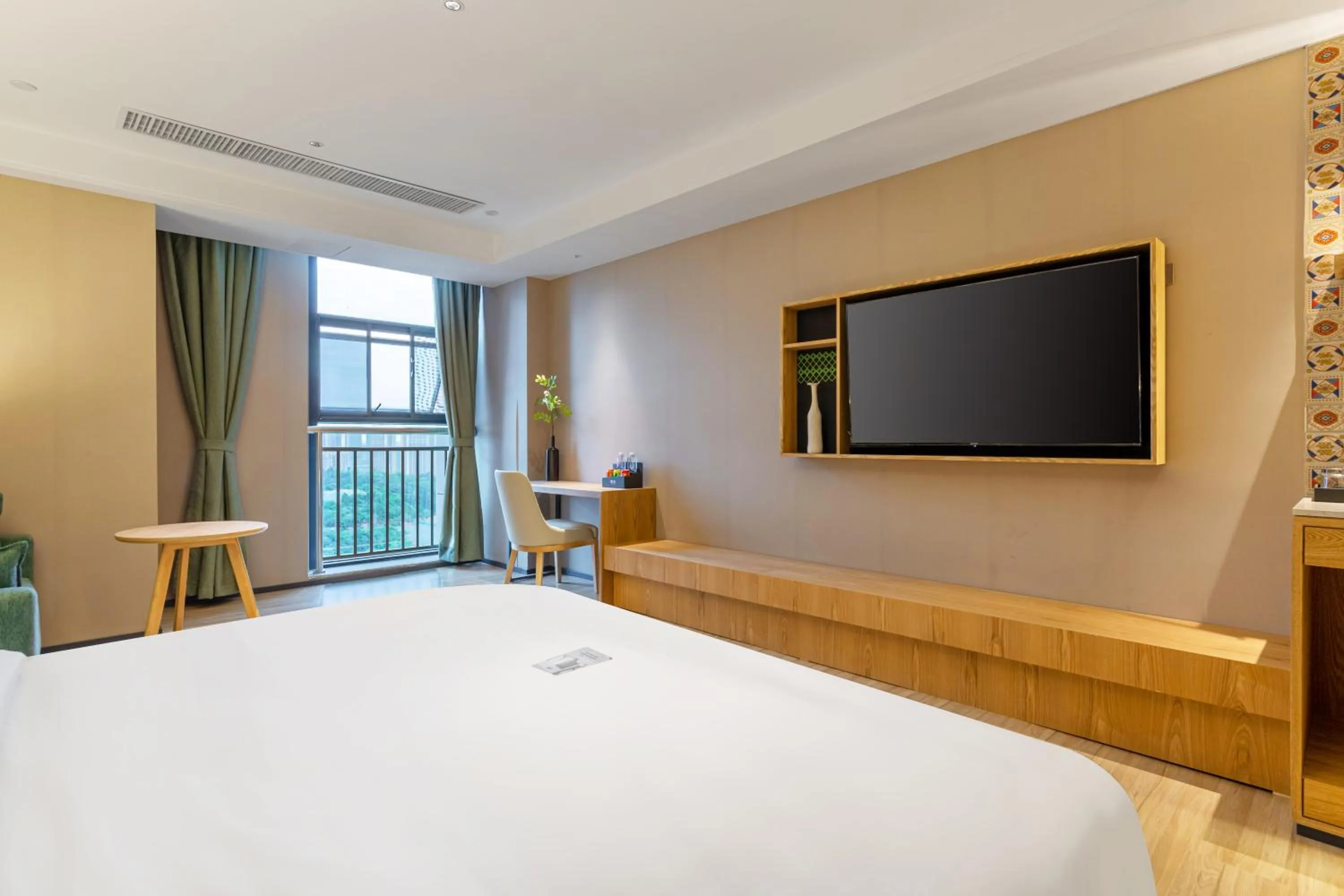 Communal lounge/ TV room, Bed in TRUE Go hotel