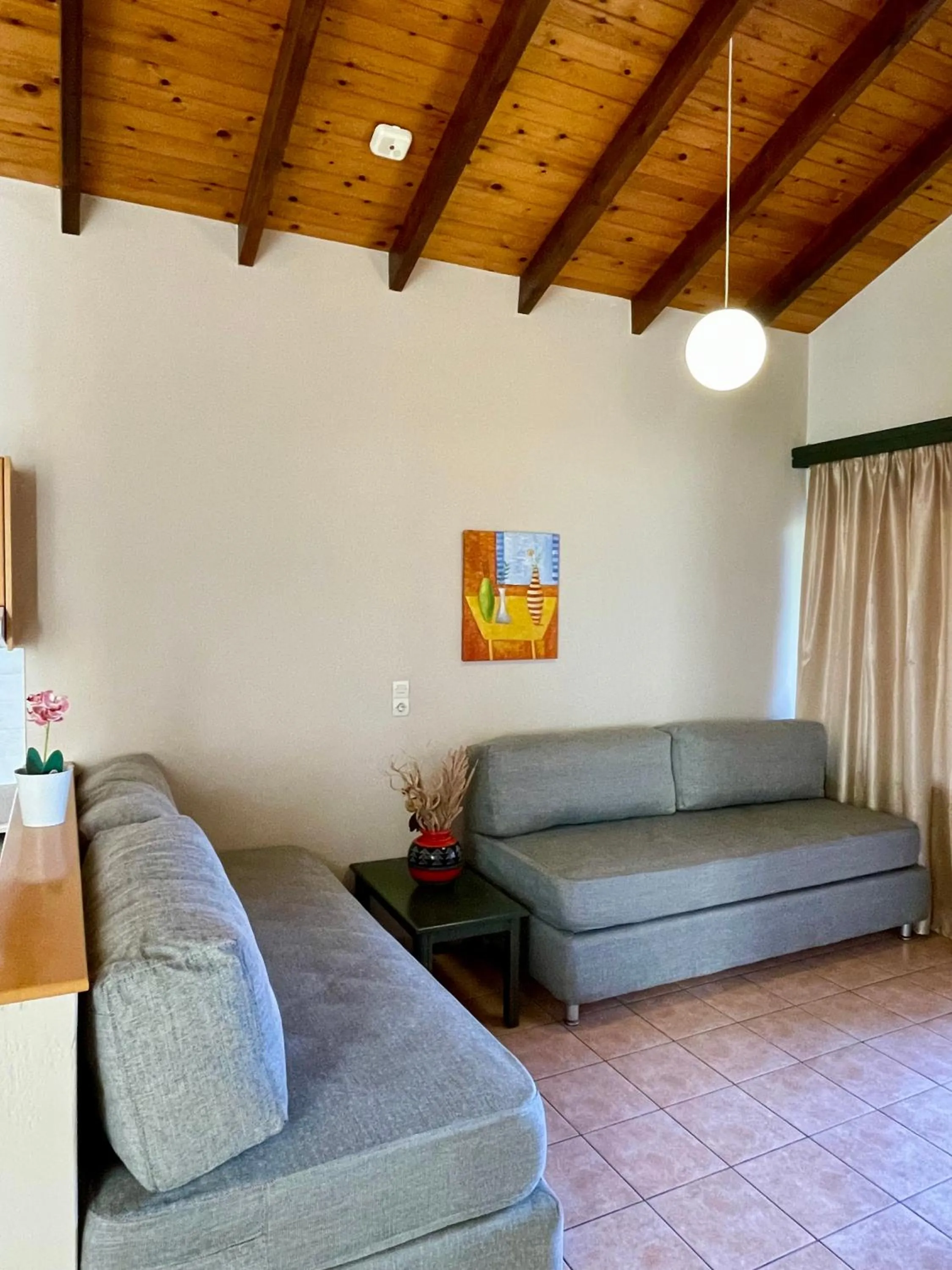 Living room in Theos Holidays Apartments