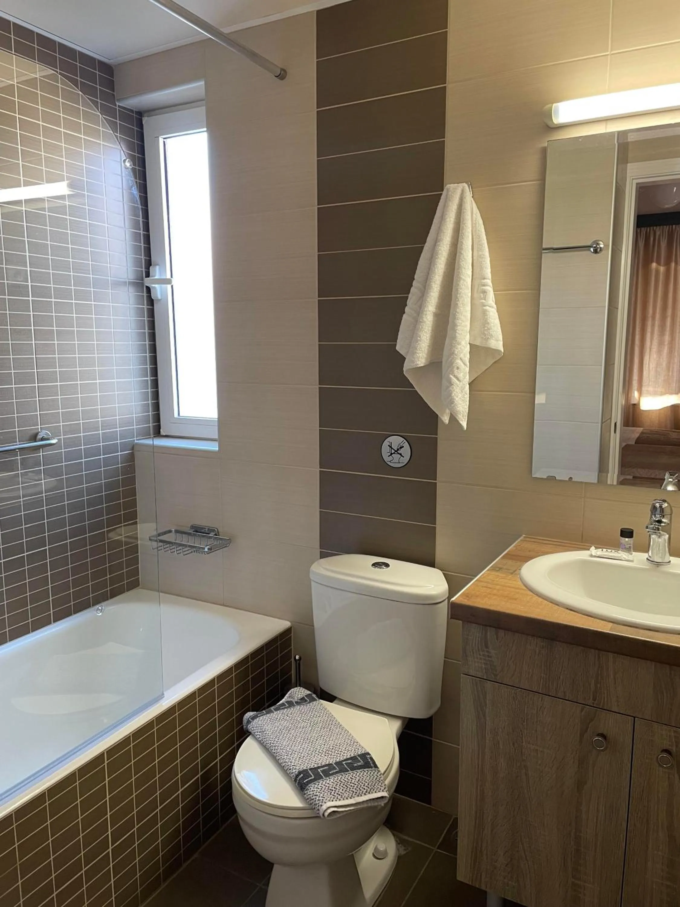 Bathroom in Theos Holidays Apartments