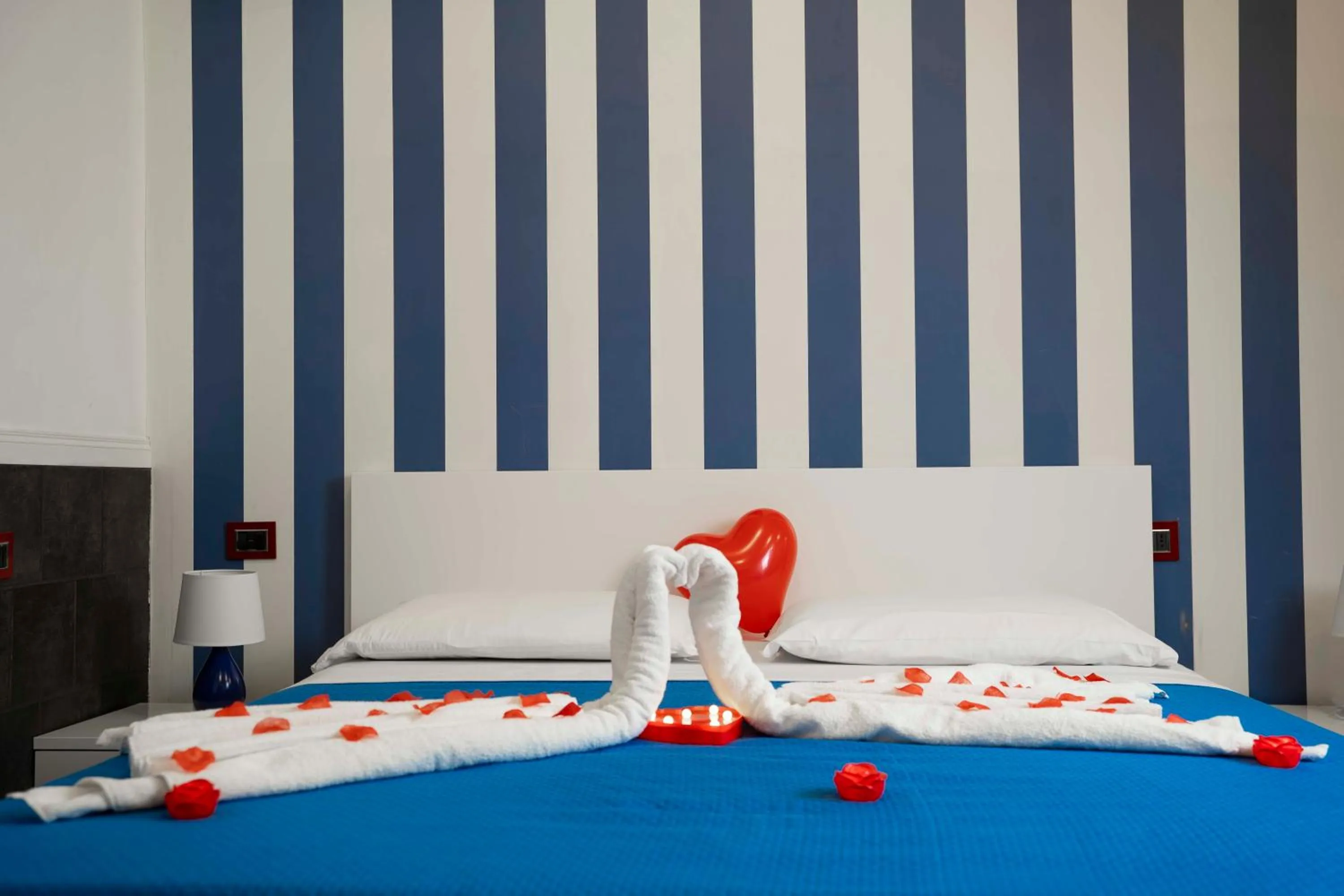 Decorative detail, Bed in Yacht Club Angioino