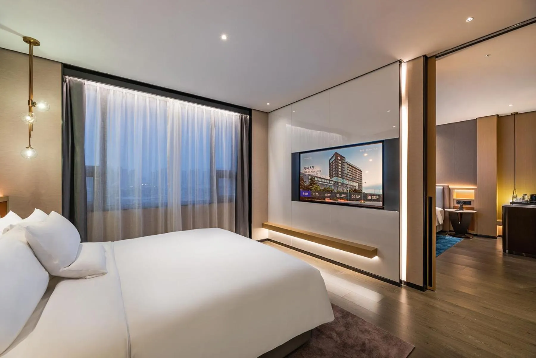 Communal lounge/ TV room, Bed in Novotel Tianjin Drum Tower