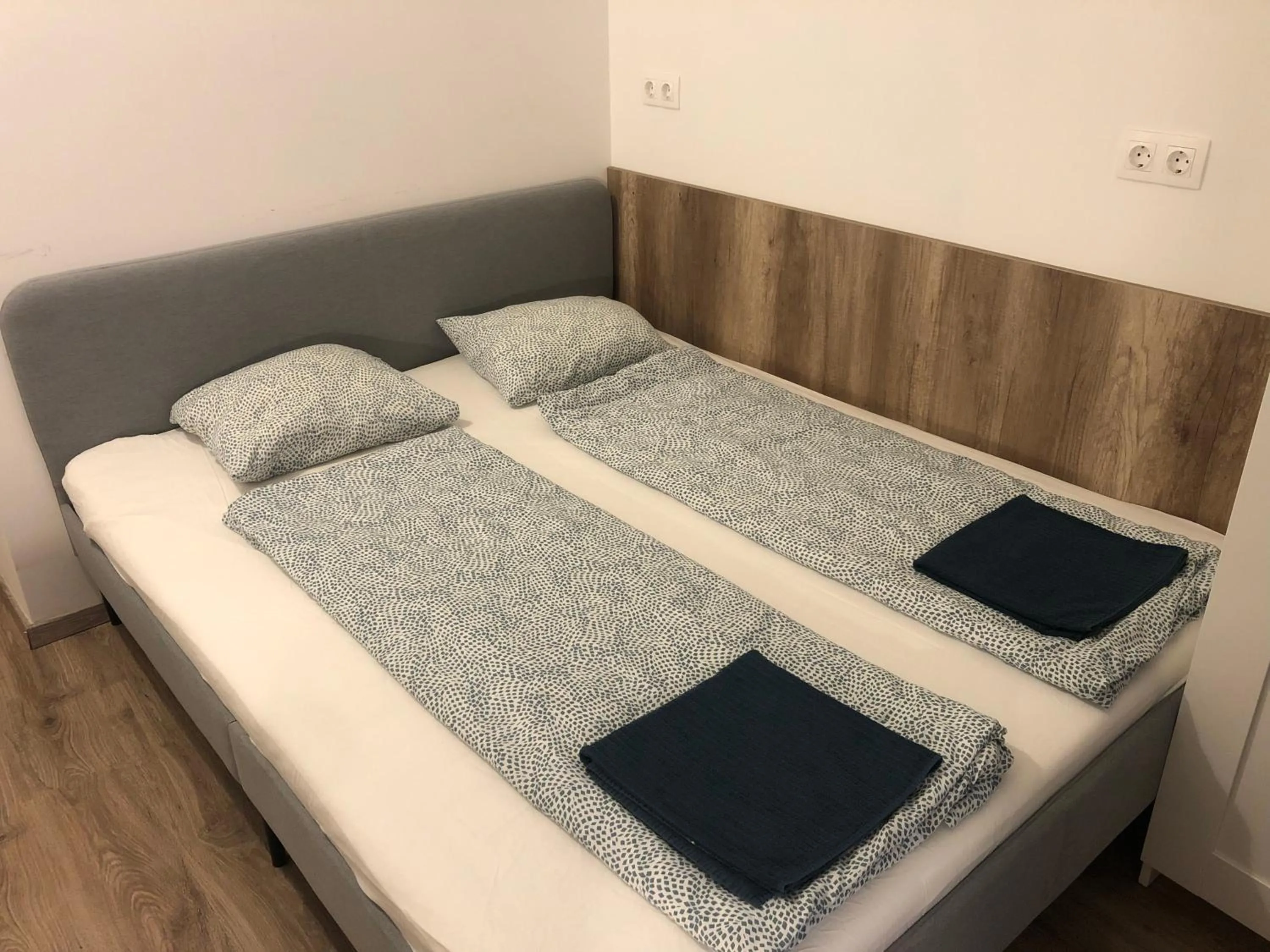 Bed in Omega Apartments Budapest