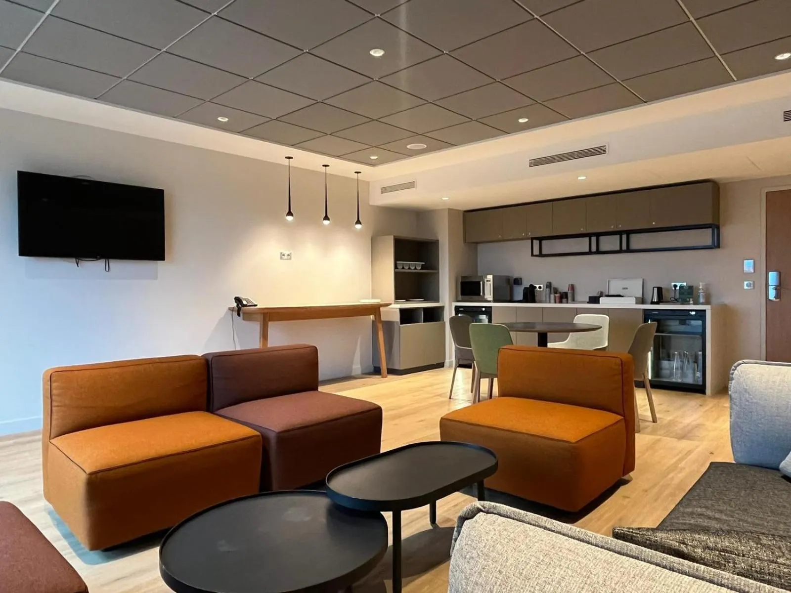 Living room in Holiday Inn Paris CDG Airport an IHG Hotel