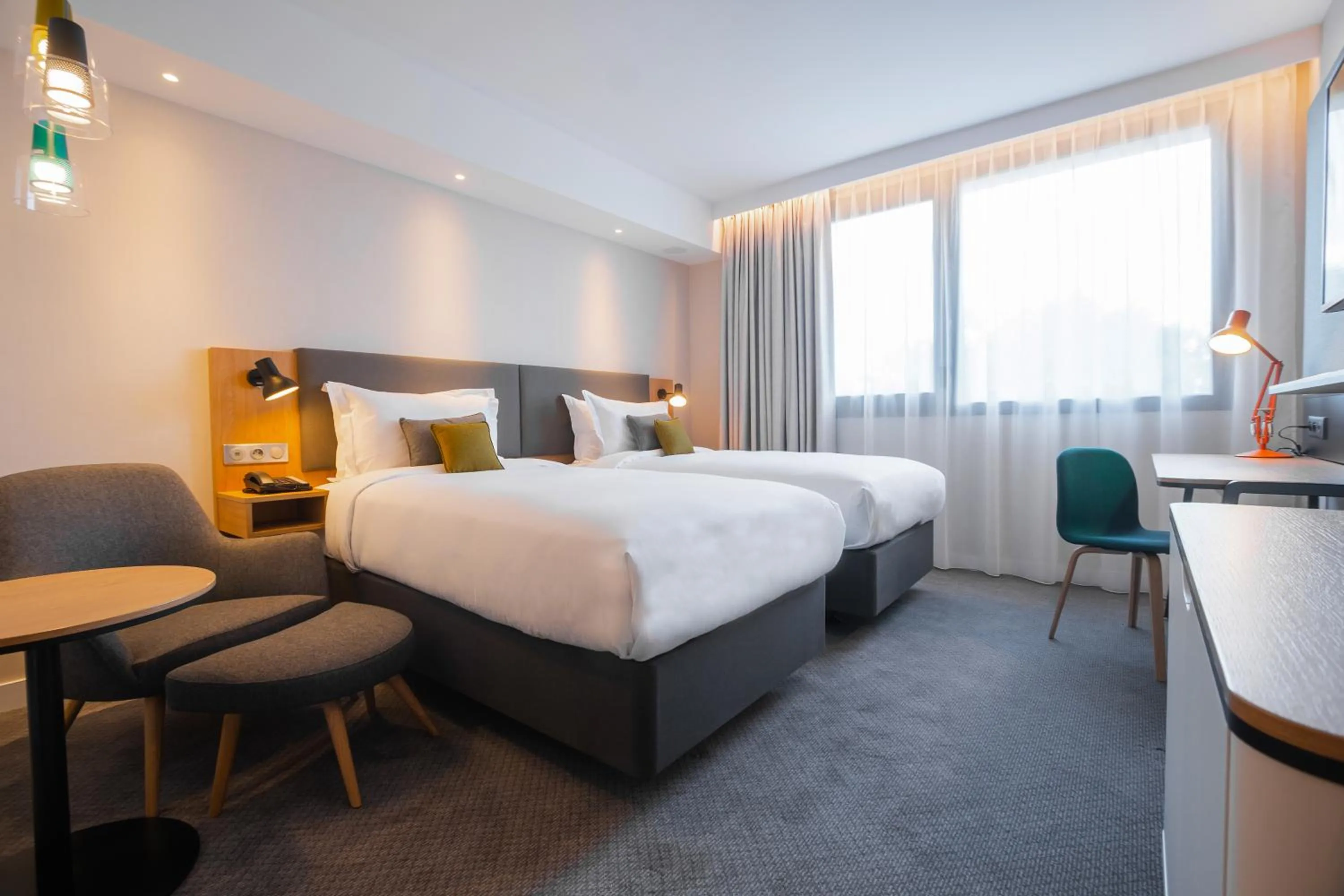 Bedroom, Bed in Holiday Inn Paris CDG Airport an IHG Hotel