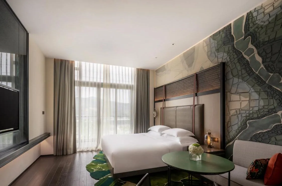 Bed in Hotel Indigo Nanjing Garden Expo, an IHG Hotel