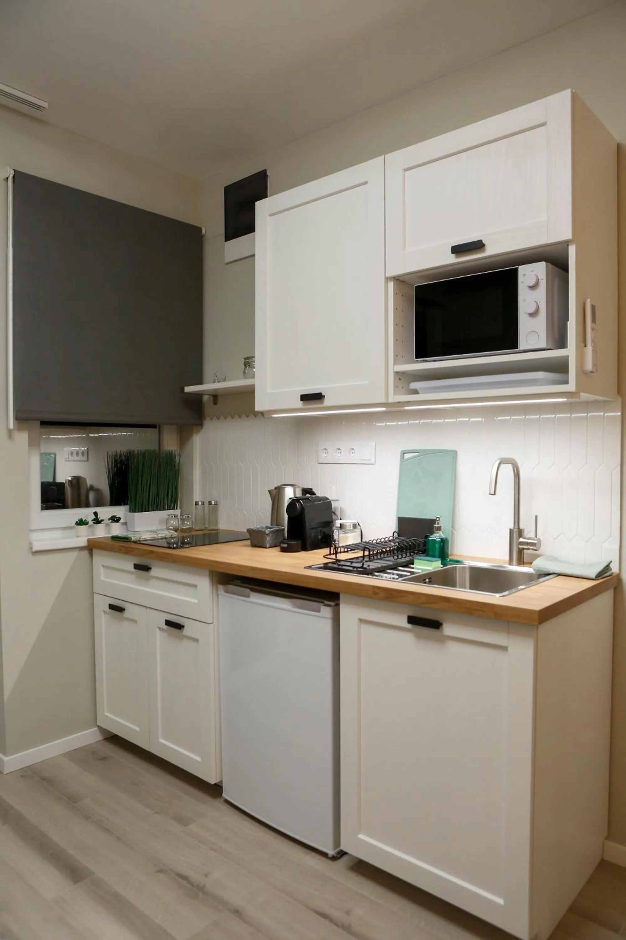 Kitchen or kitchenette in Akacfa Holiday Apartments