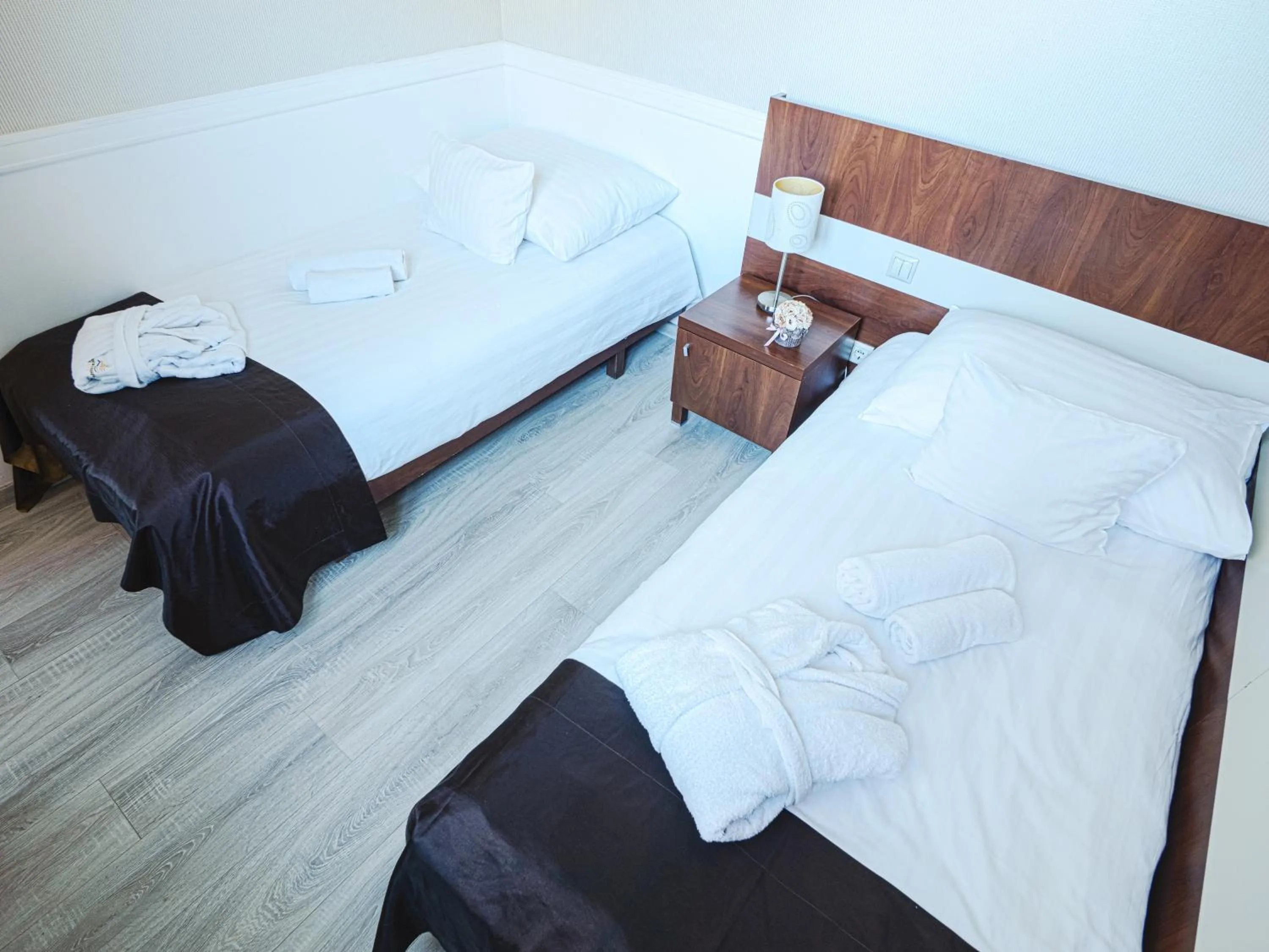 Bed in Holiday Beach Budapest Hotel