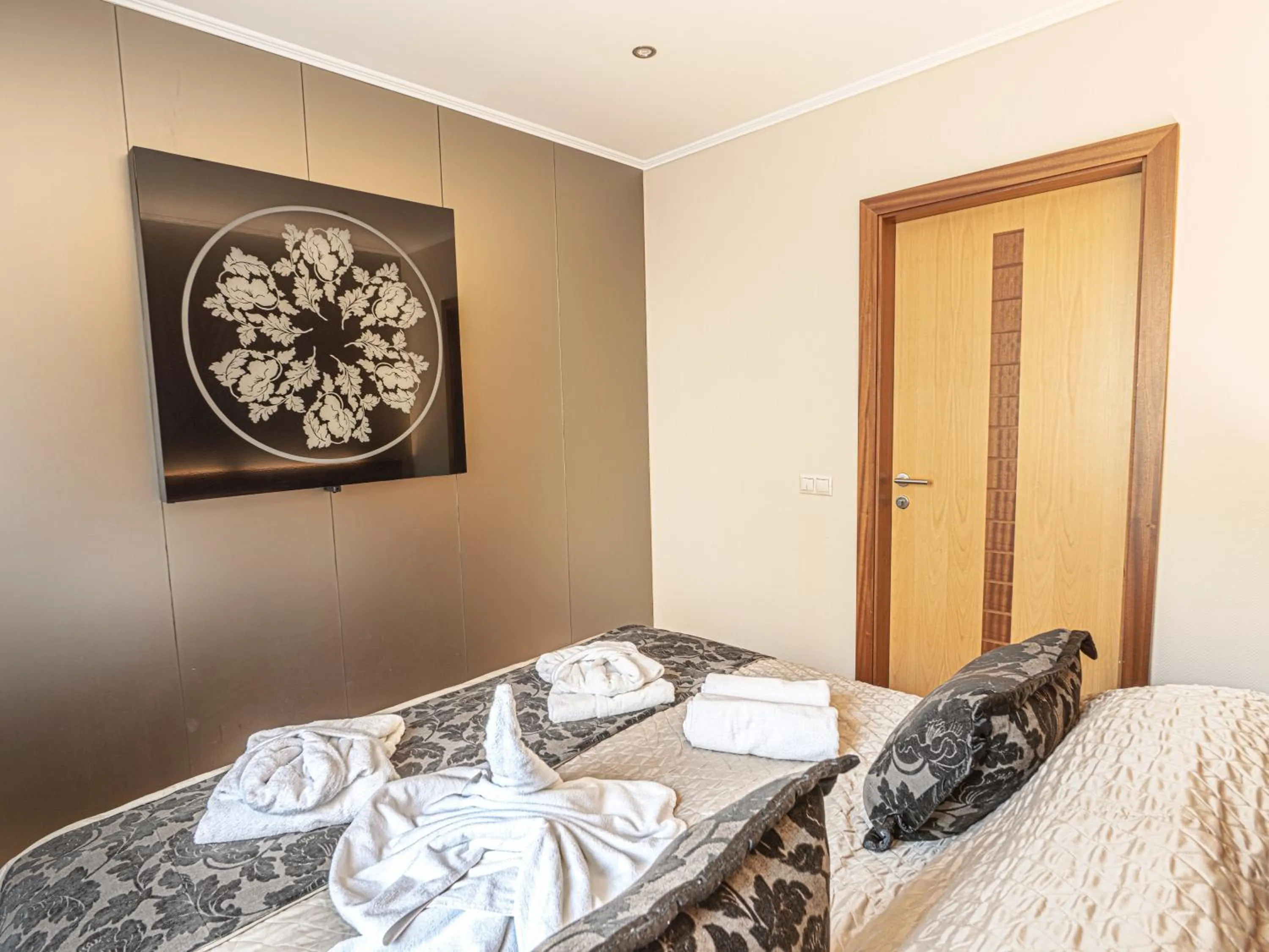 Photo of the whole room, Bed in Holiday Beach Budapest Hotel