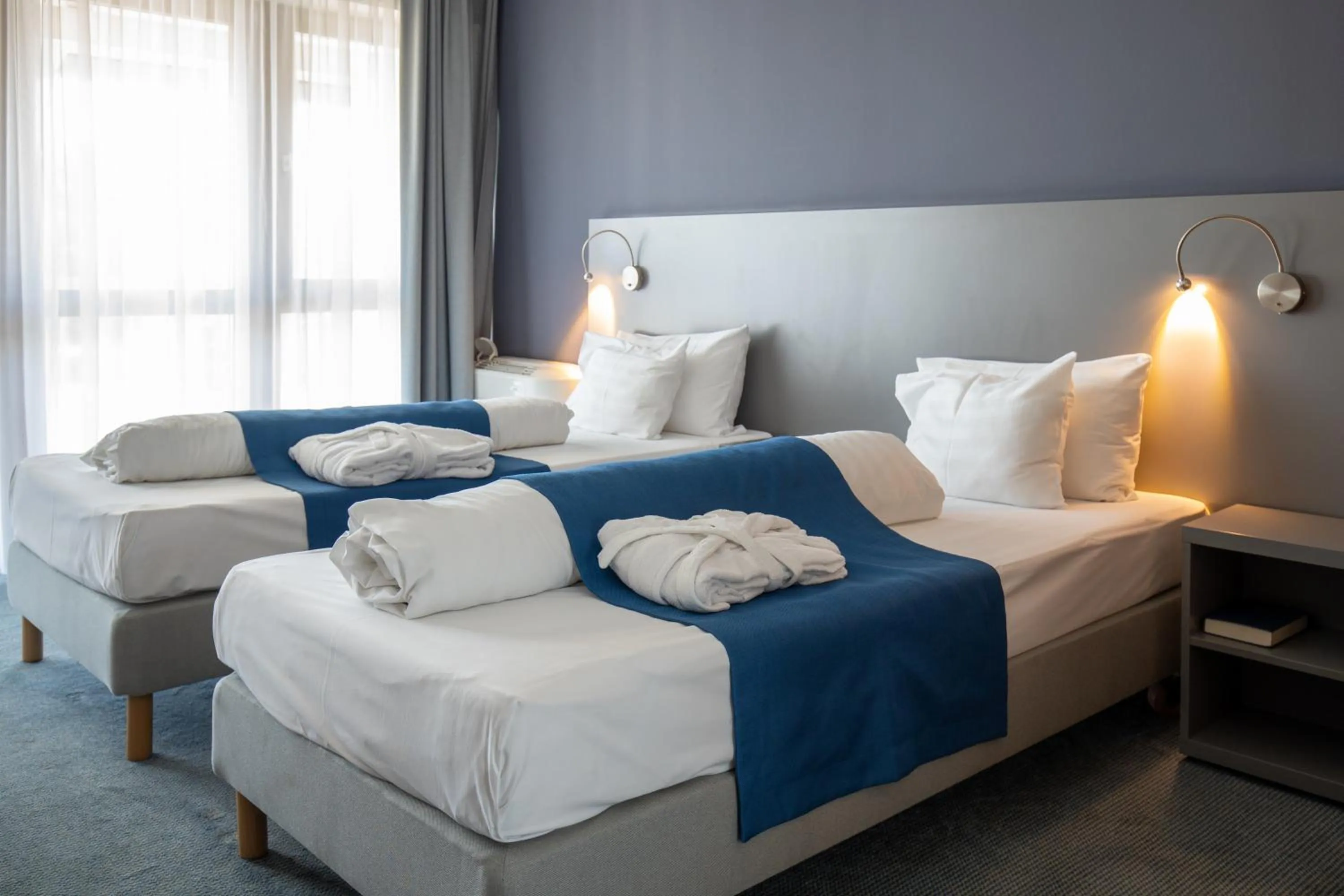 Bed in Hotel Yacht Wellness & Business