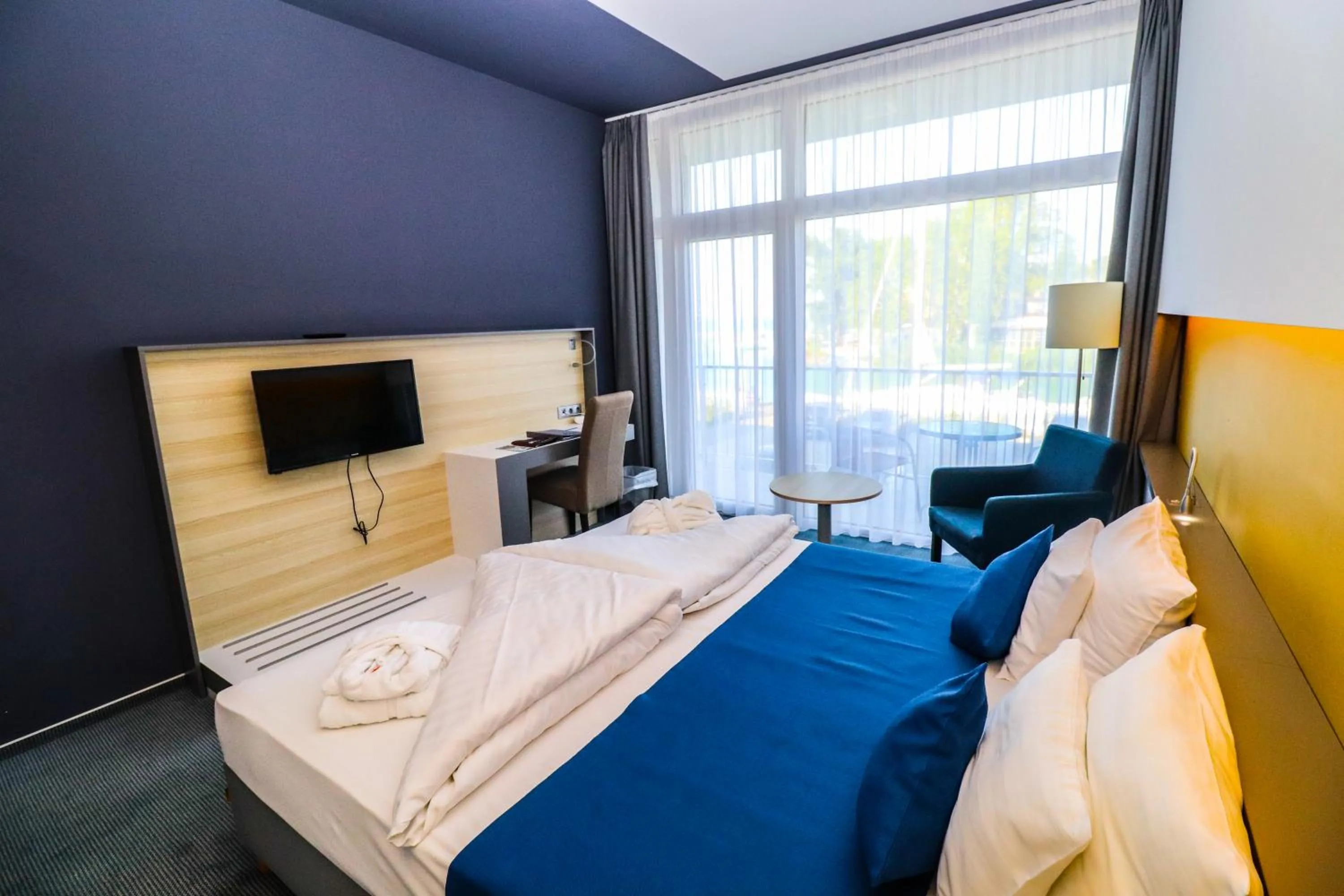 Bed in Hotel Yacht Wellness & Business