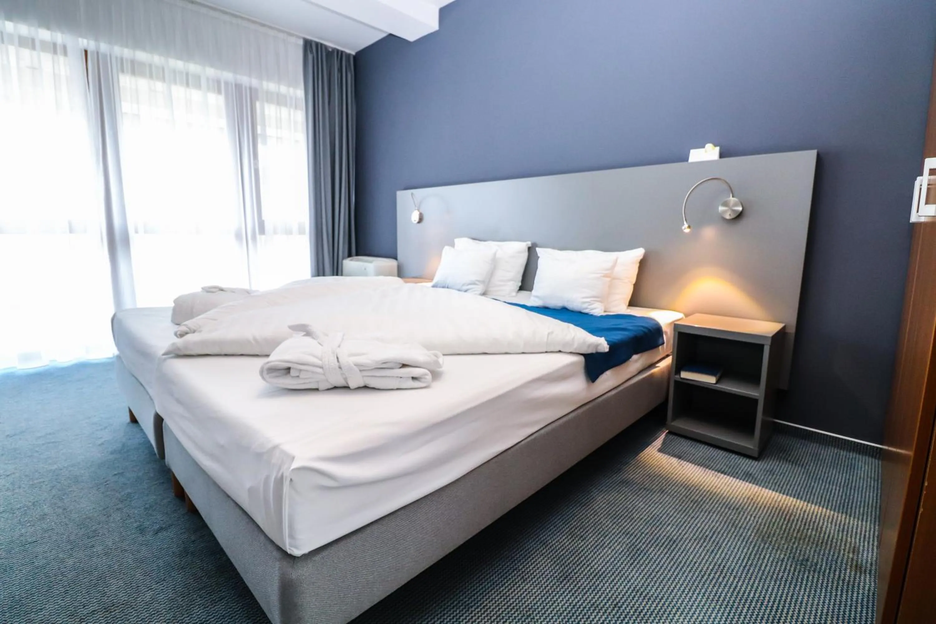 Bed in Hotel Yacht Wellness & Business