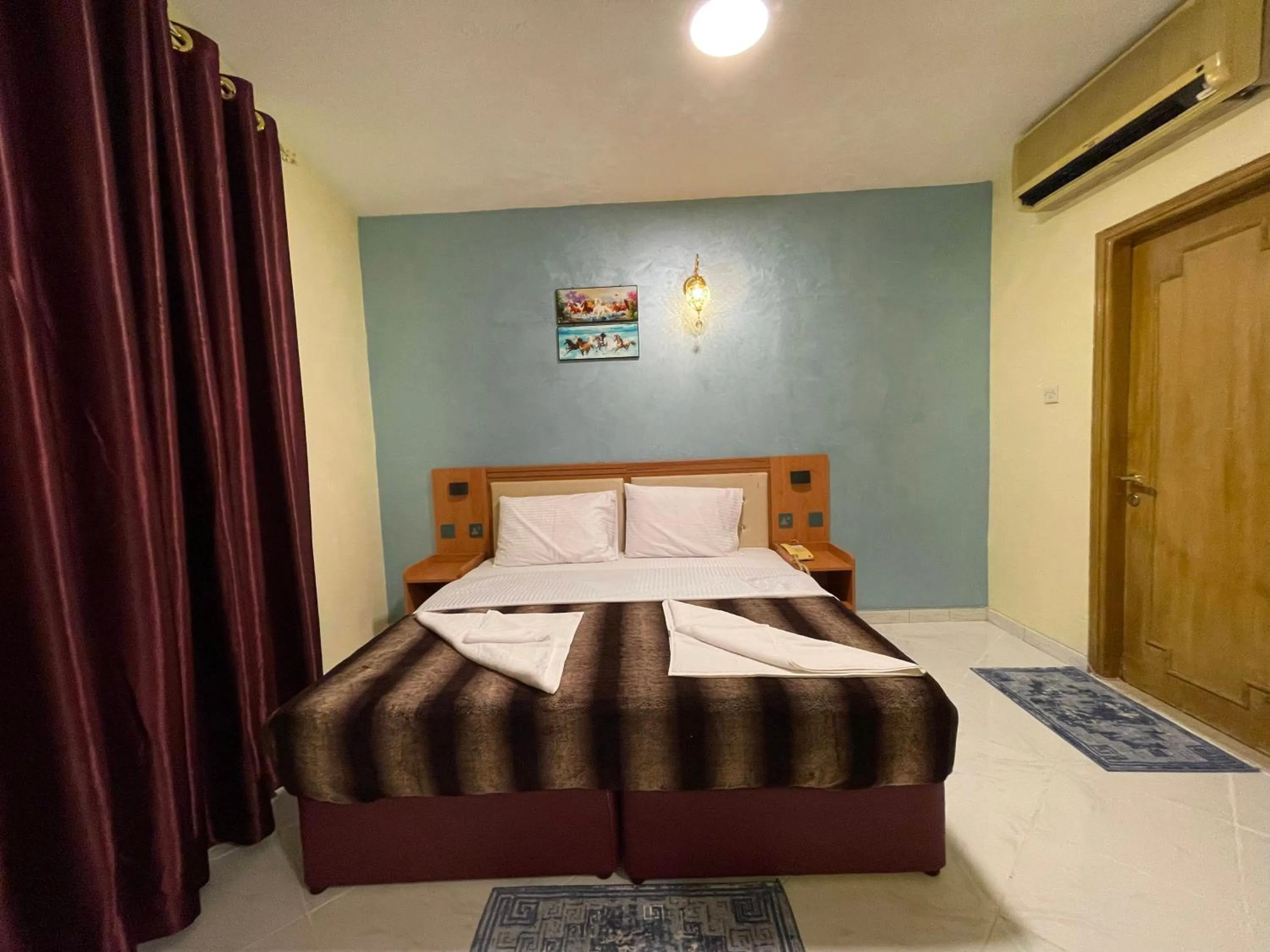 Bed in MOUNT SINA HOTEL By AURA