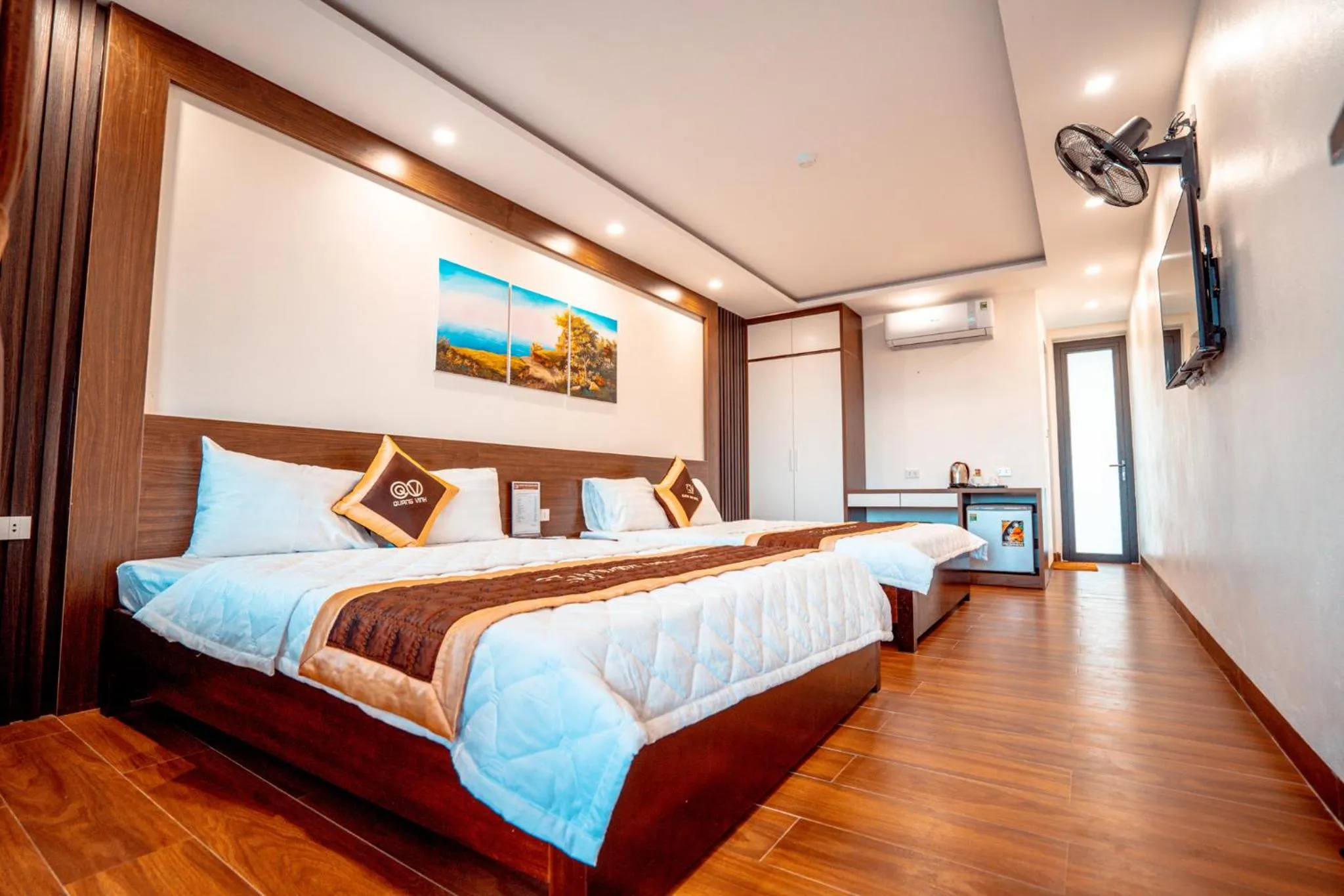 Bed in QUANG VINH HOTEL