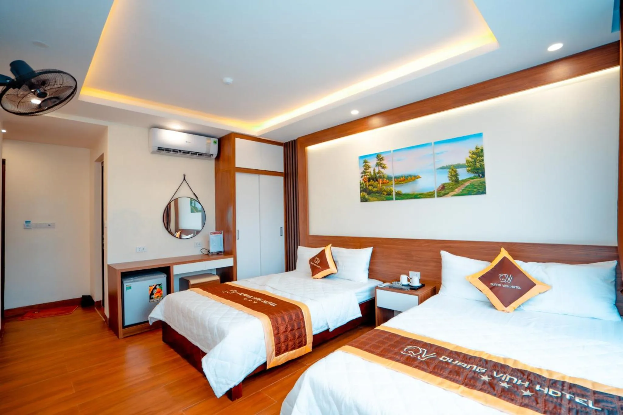 Bed in QUANG VINH HOTEL