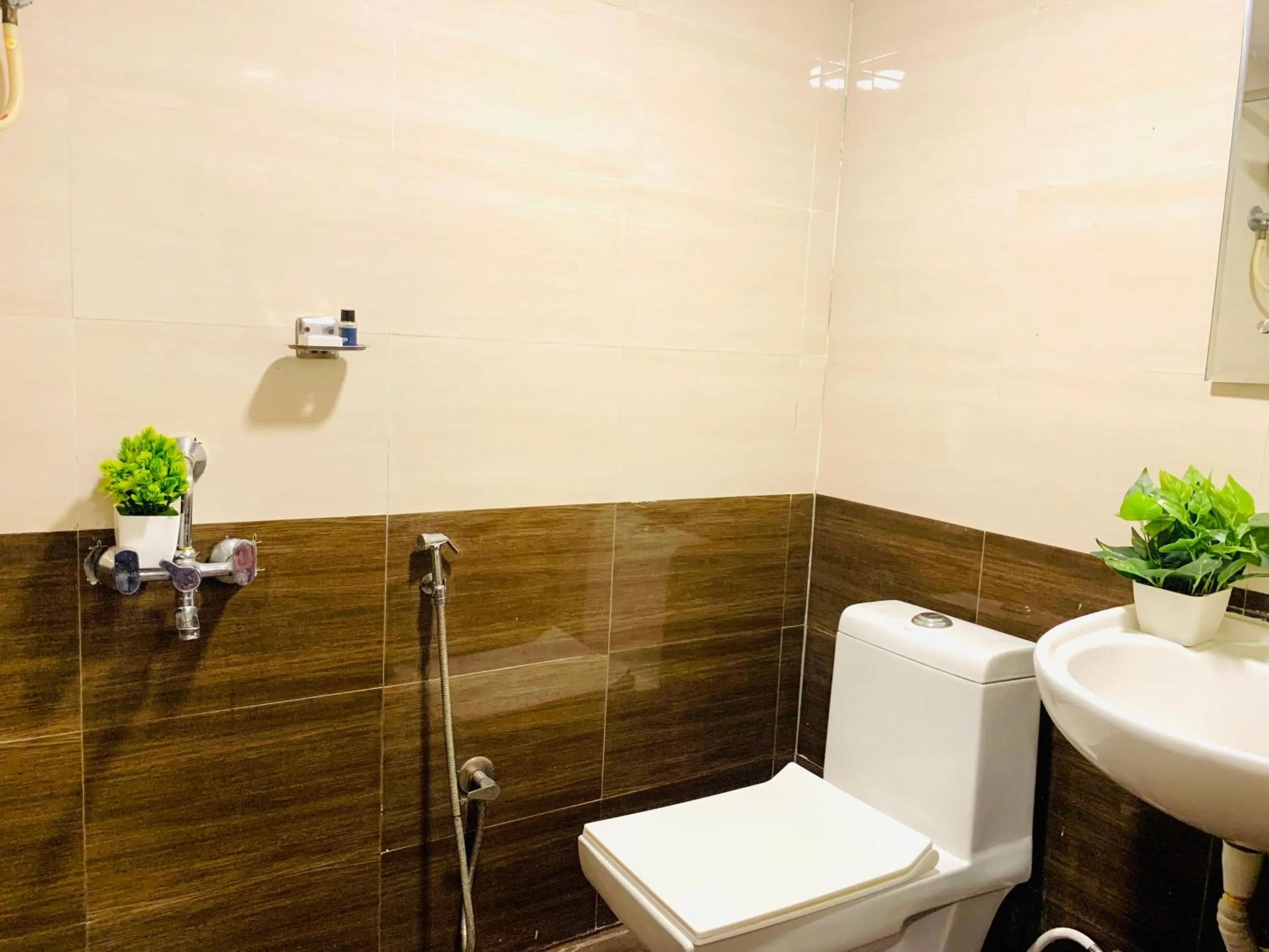 Bathroom in Hotel oak by signature airport zone hyderabad