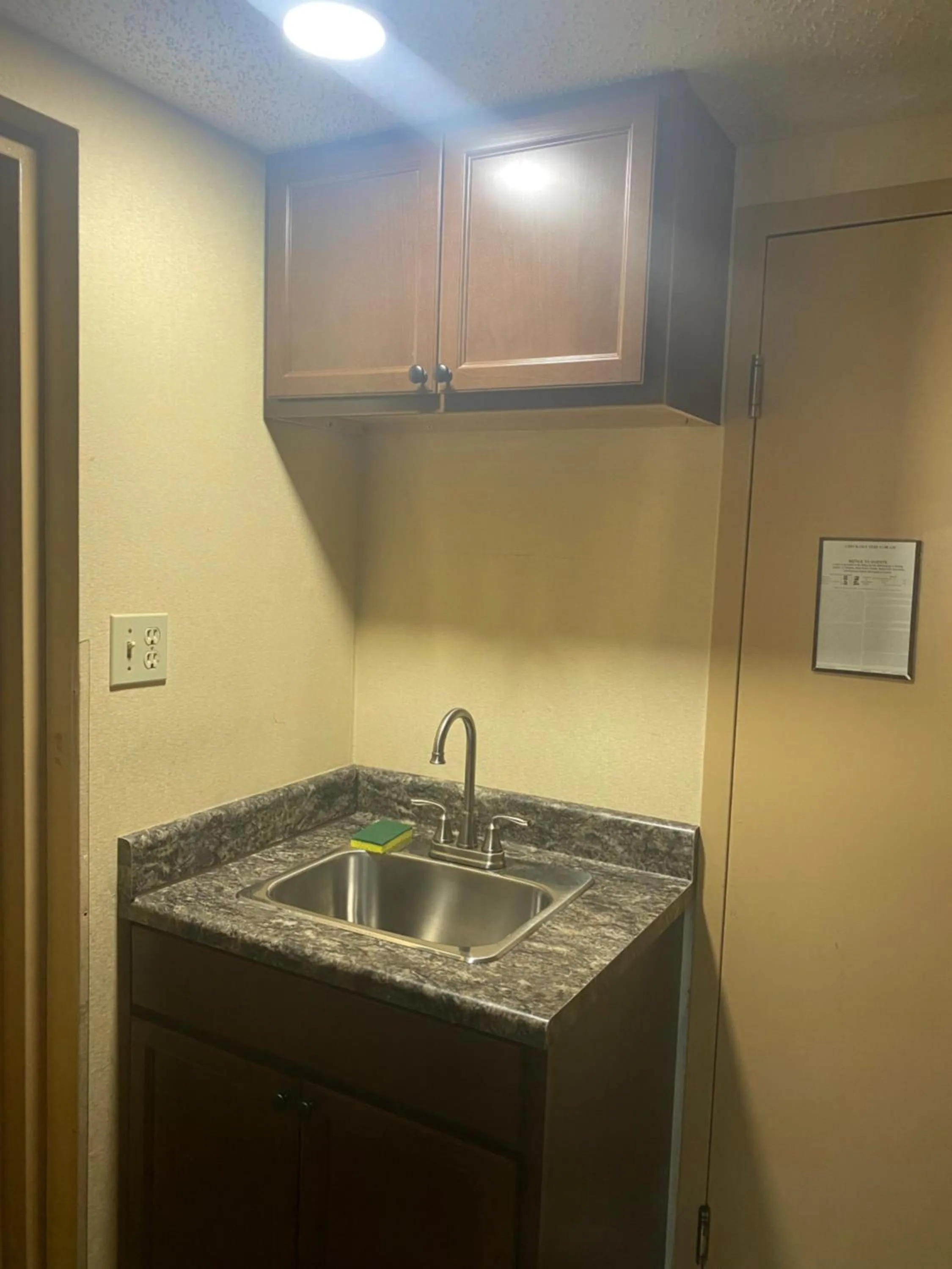 Kitchen or kitchenette in Suburban Studios Buffalo Airport