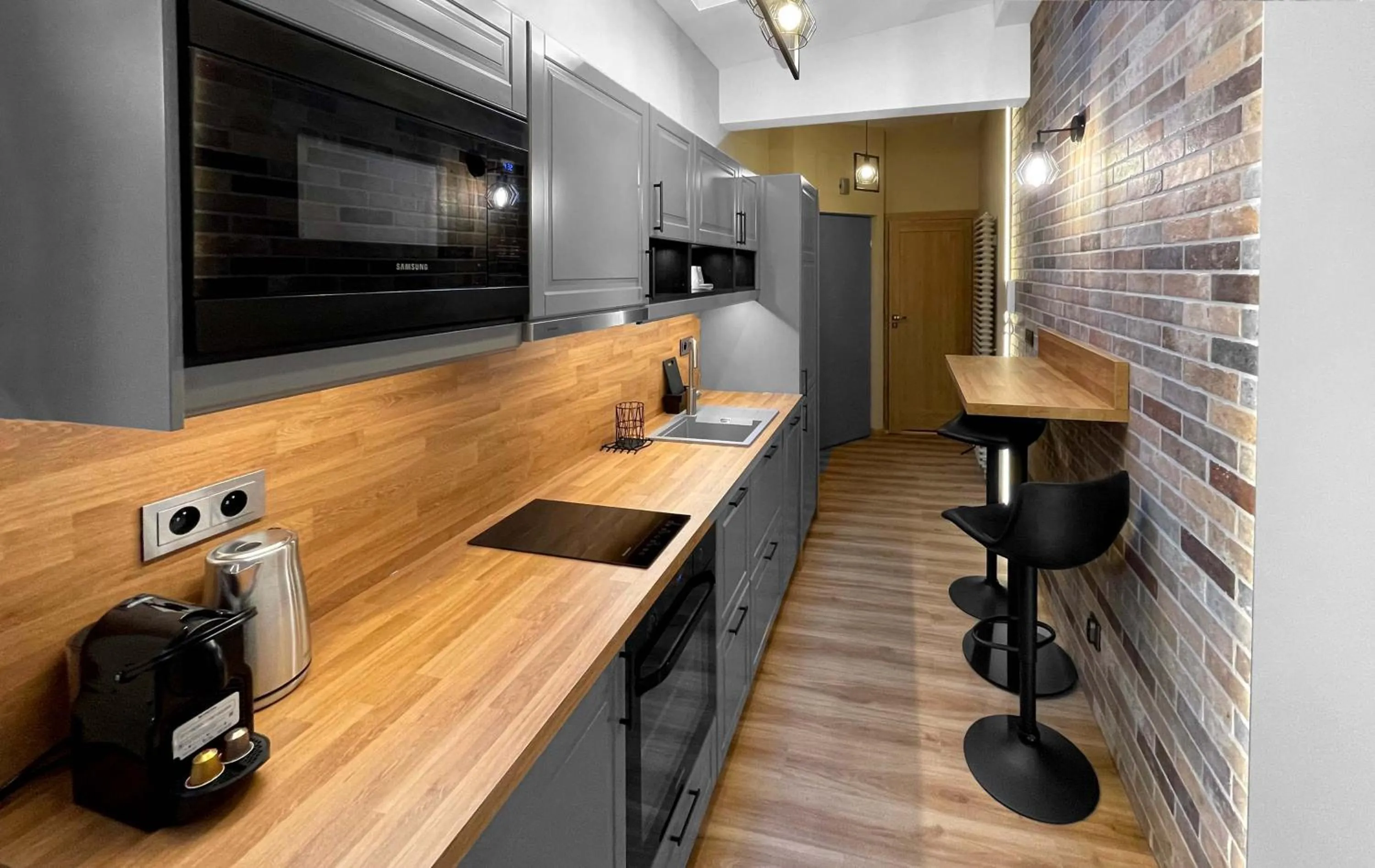 Kitchen or kitchenette in Starowiślna 41-43 by PI Apartments