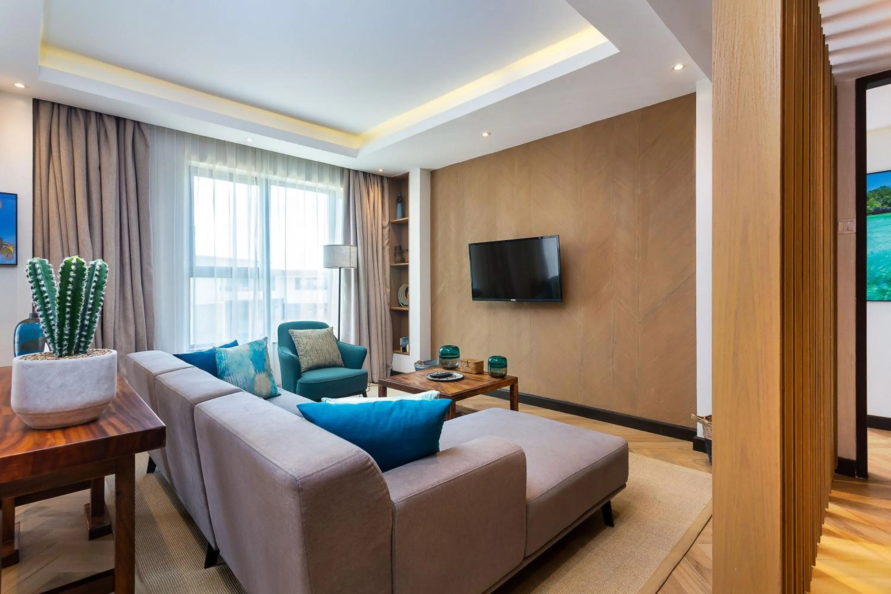TV and multimedia in Ulwazi Place Hotel by Trianum
