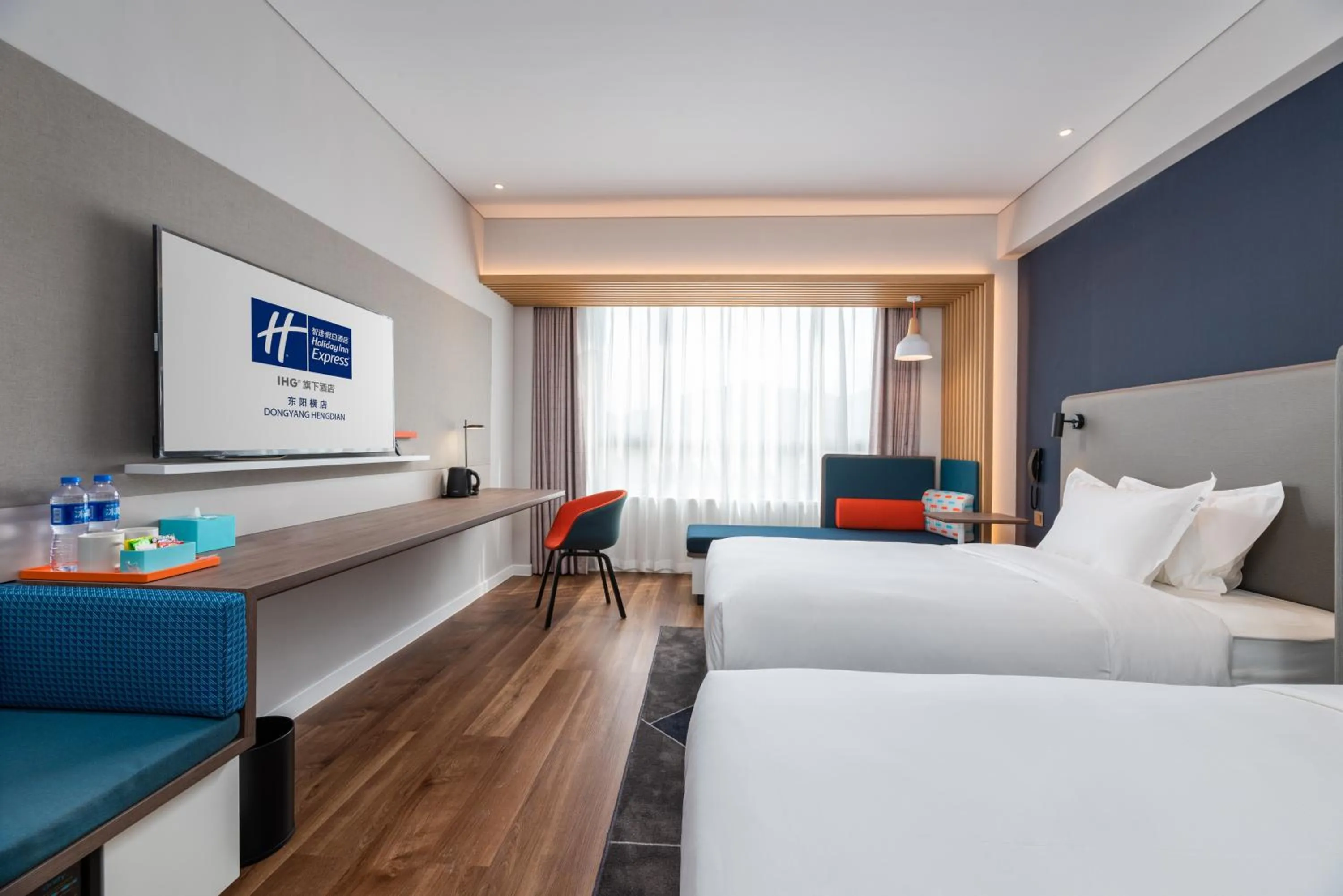 Bed in Holiday Inn Express Dongyang Hengdian, an IHG Hotel