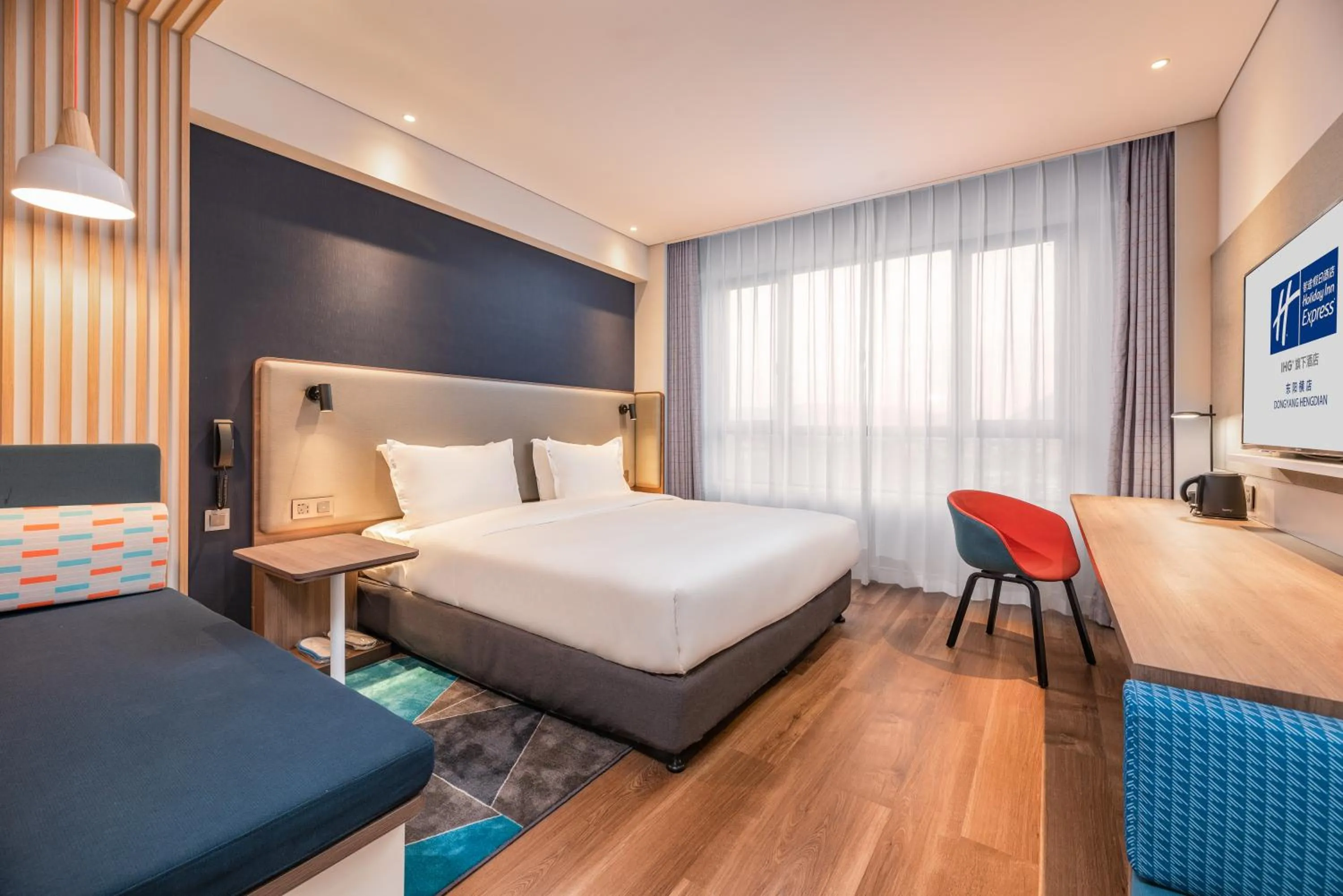 Bed in Holiday Inn Express Dongyang Hengdian, an IHG Hotel