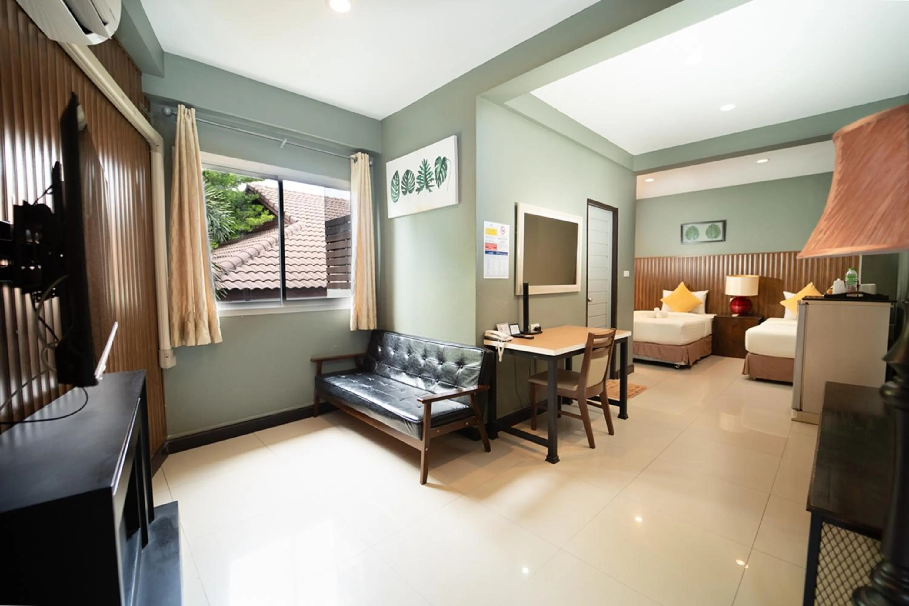 Bed in The Palm Hotel