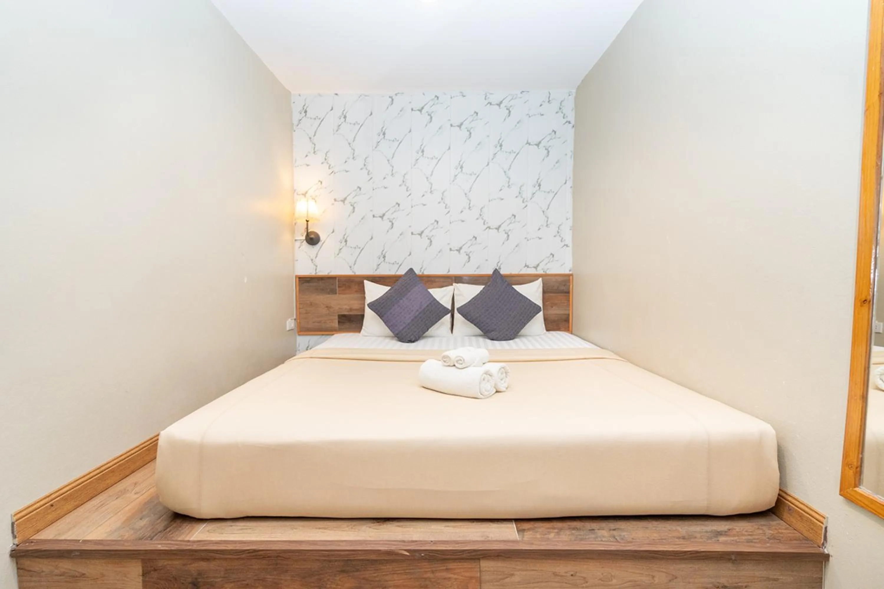 Bed in The Palm Hotel