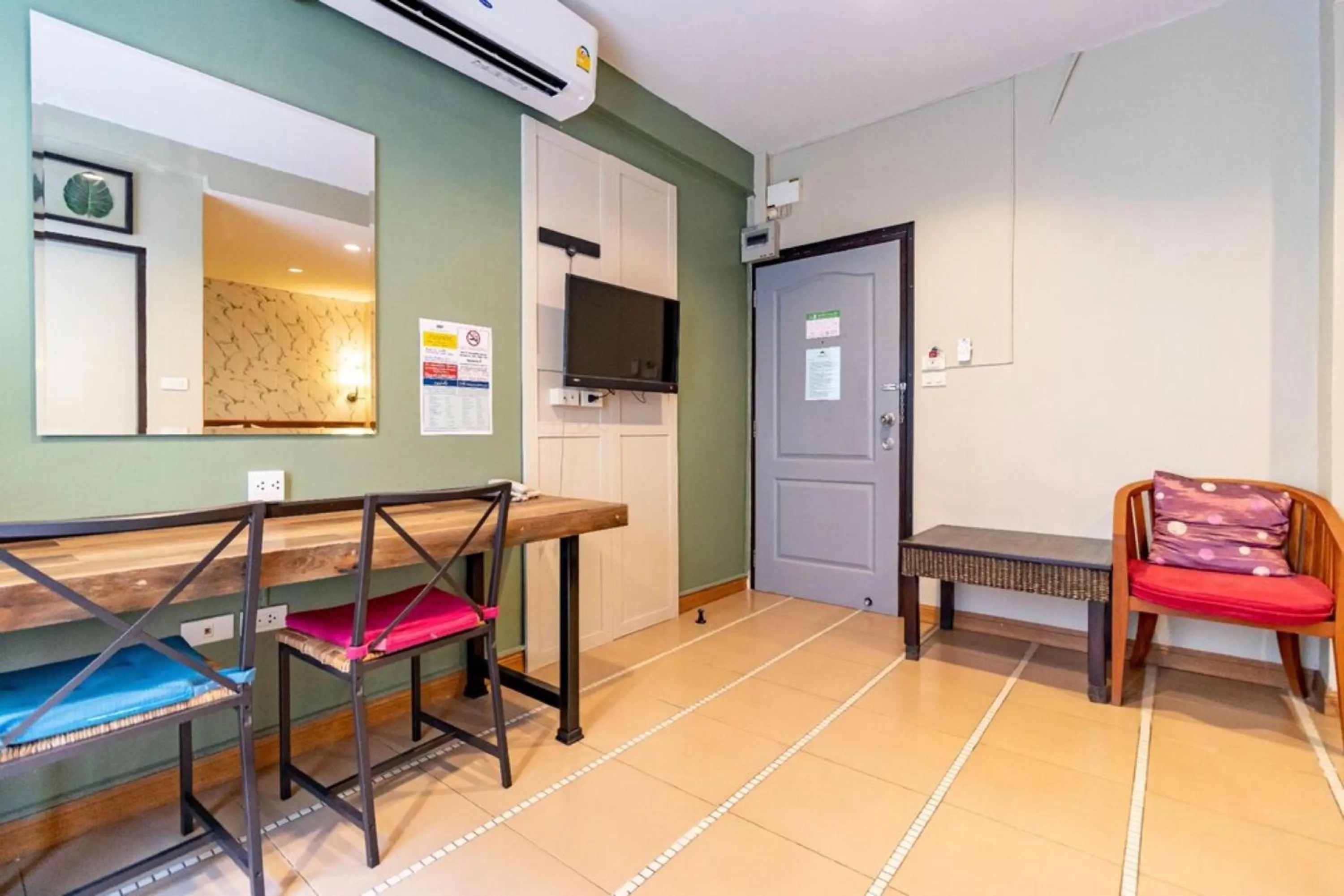 Bedroom in The Palm Hotel