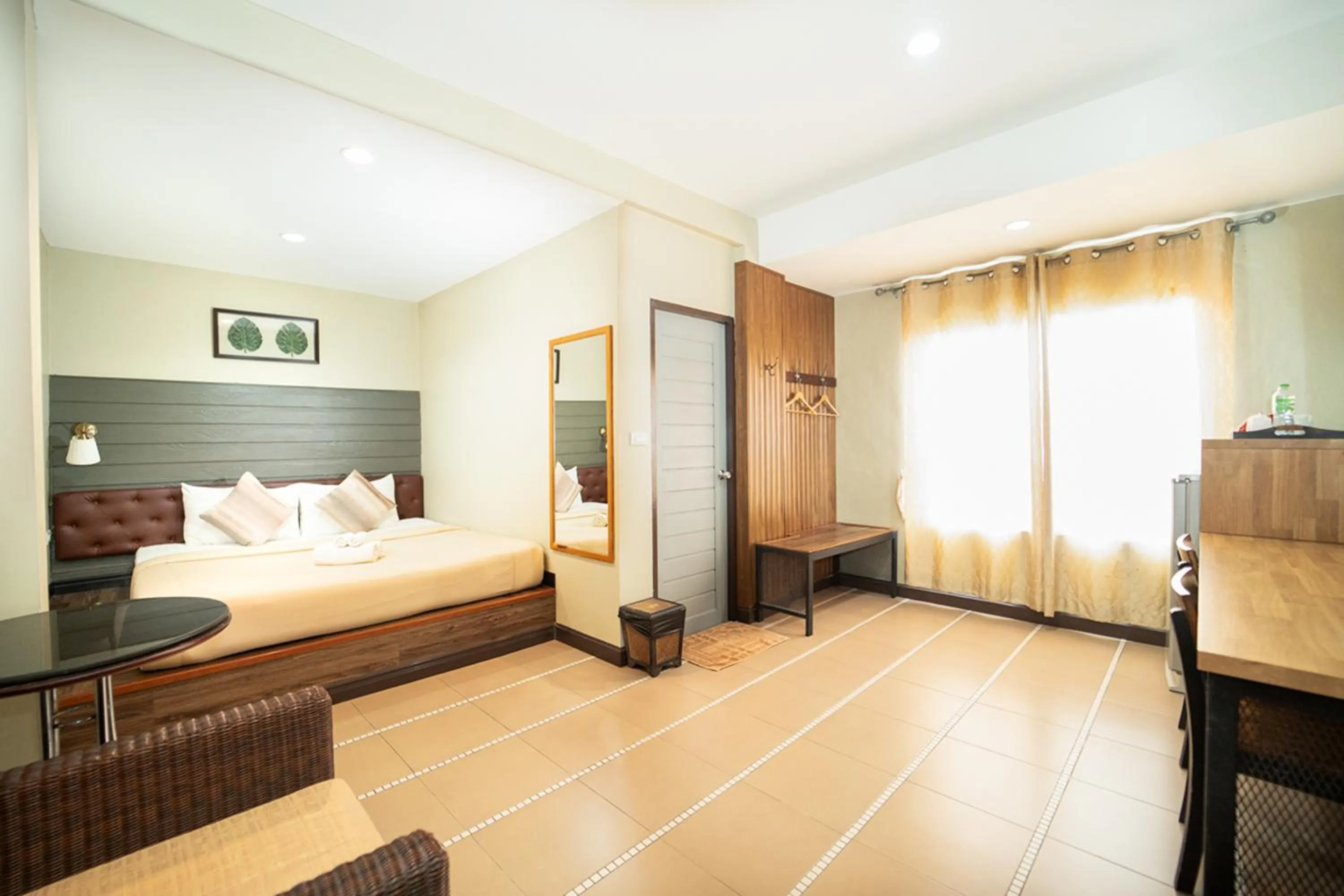 Bed in The Palm Hotel