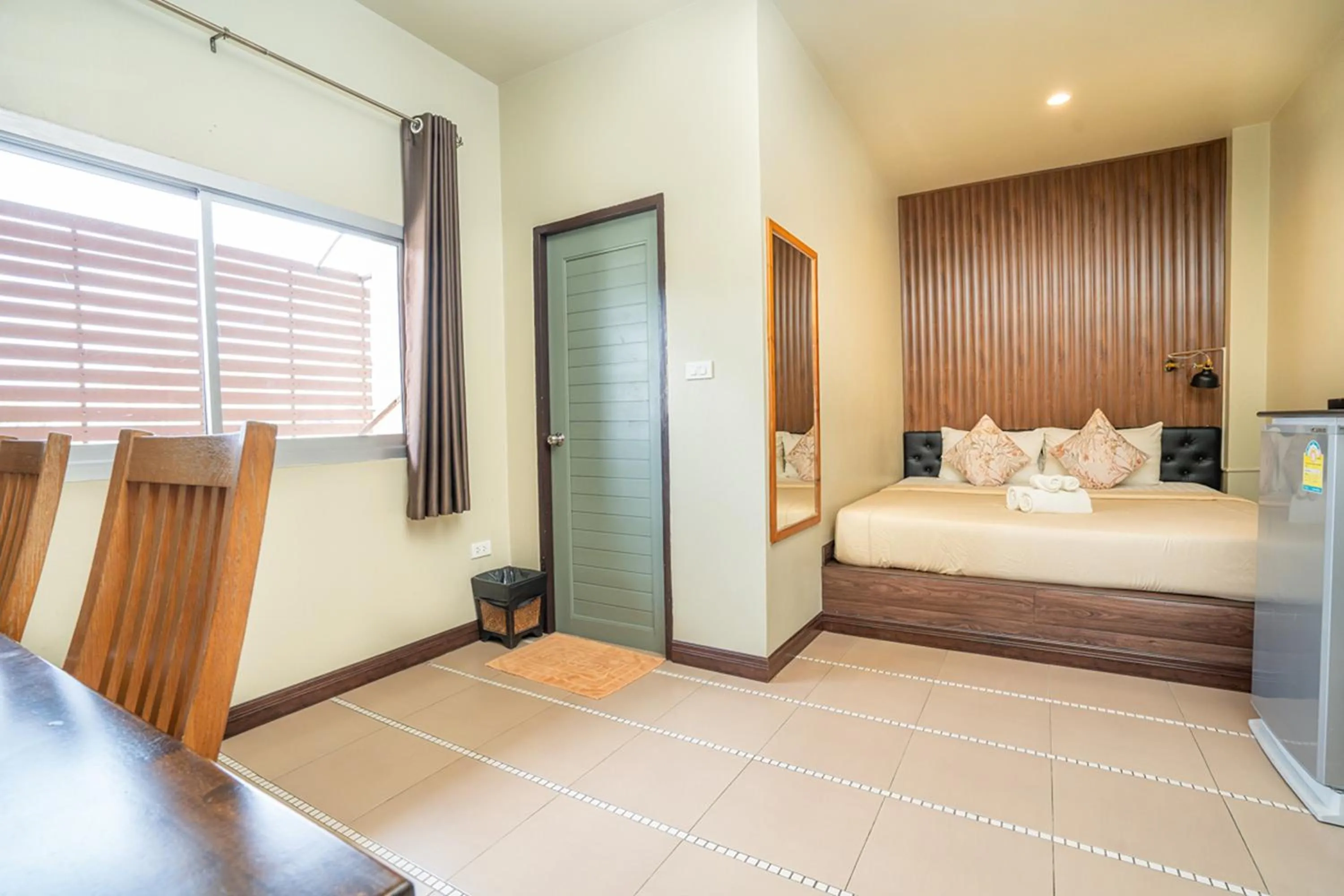 Bed in The Palm Hotel