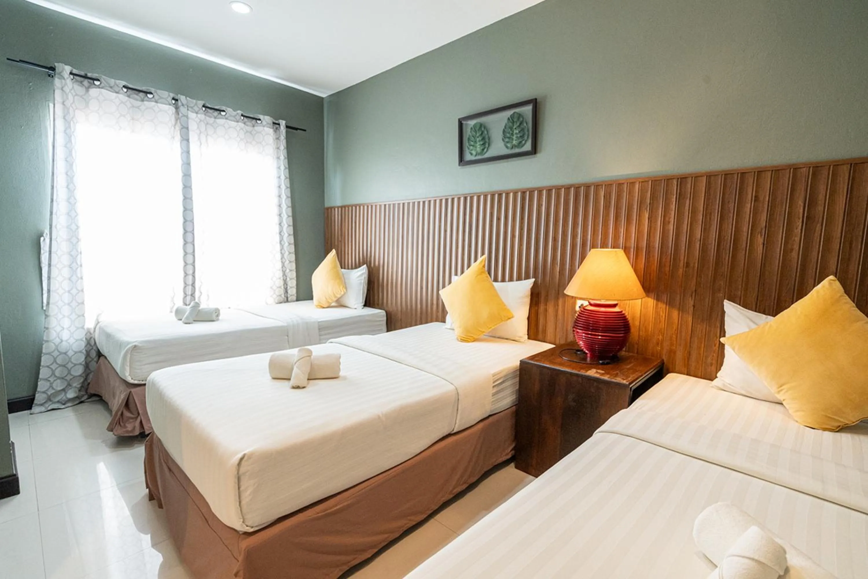 Bed in The Palm Hotel