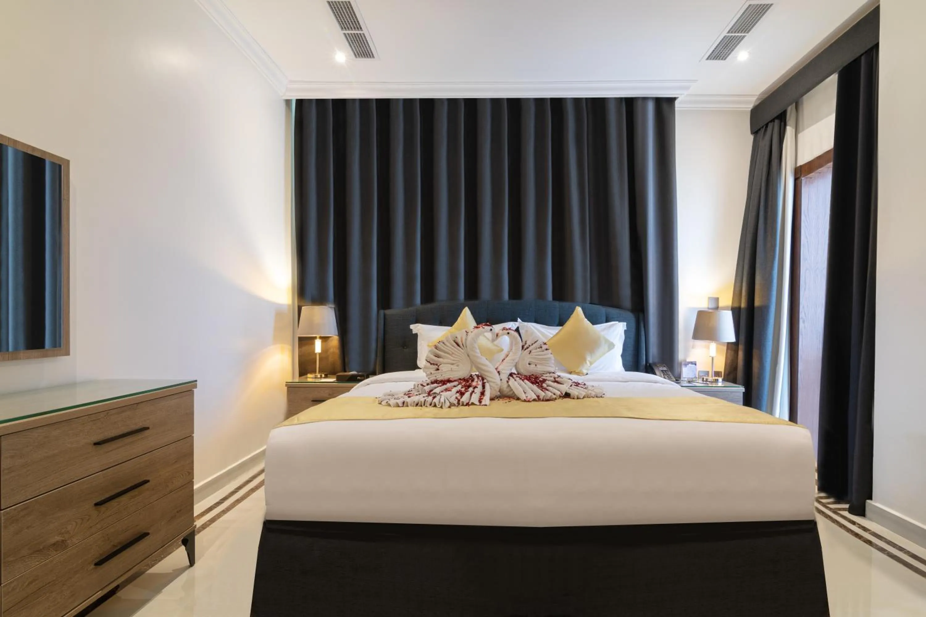 Bed in The Gate Hotel and Apartments