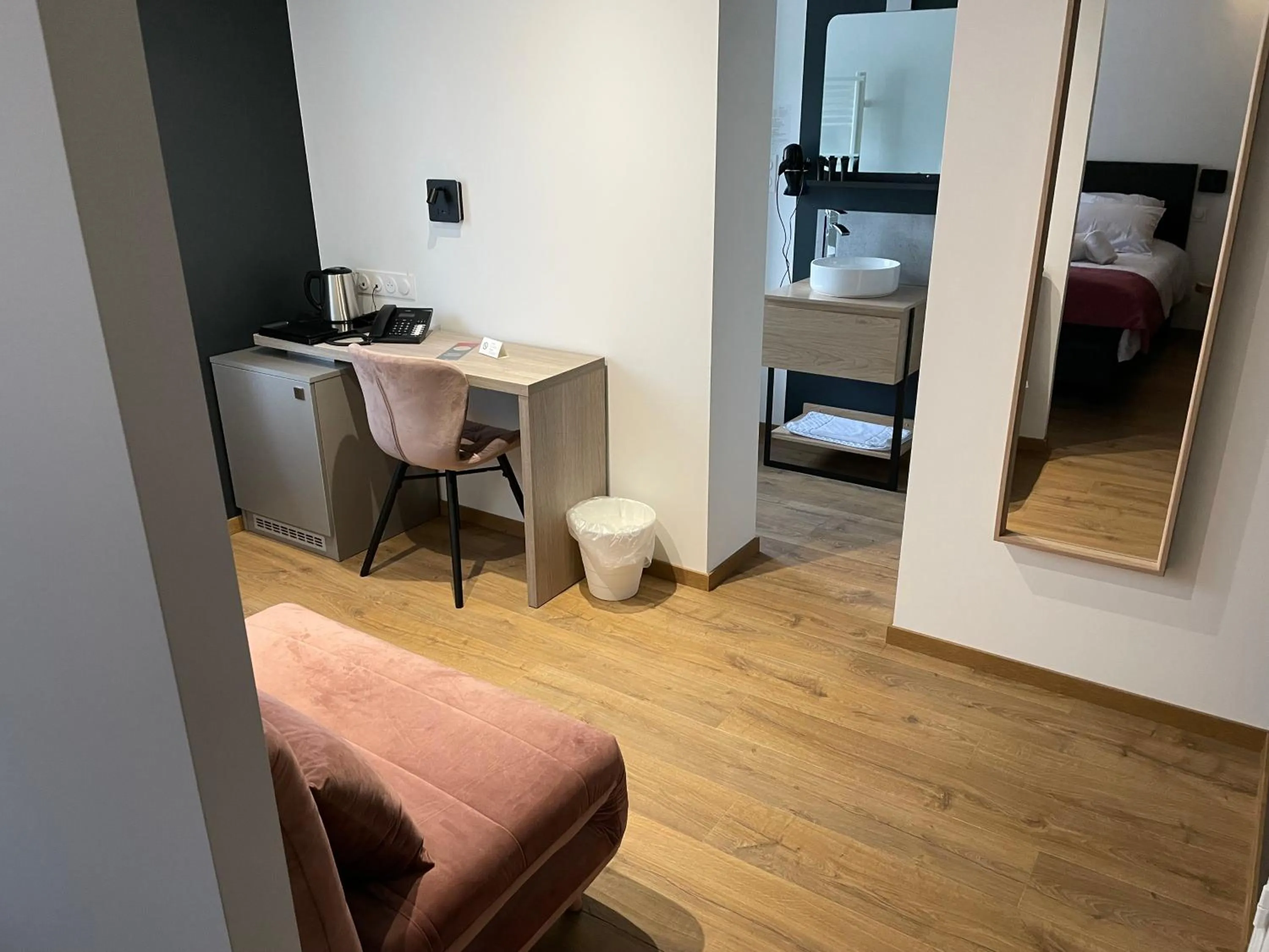 Seating area, Bathroom in Hôtel & Spa du Tremplin