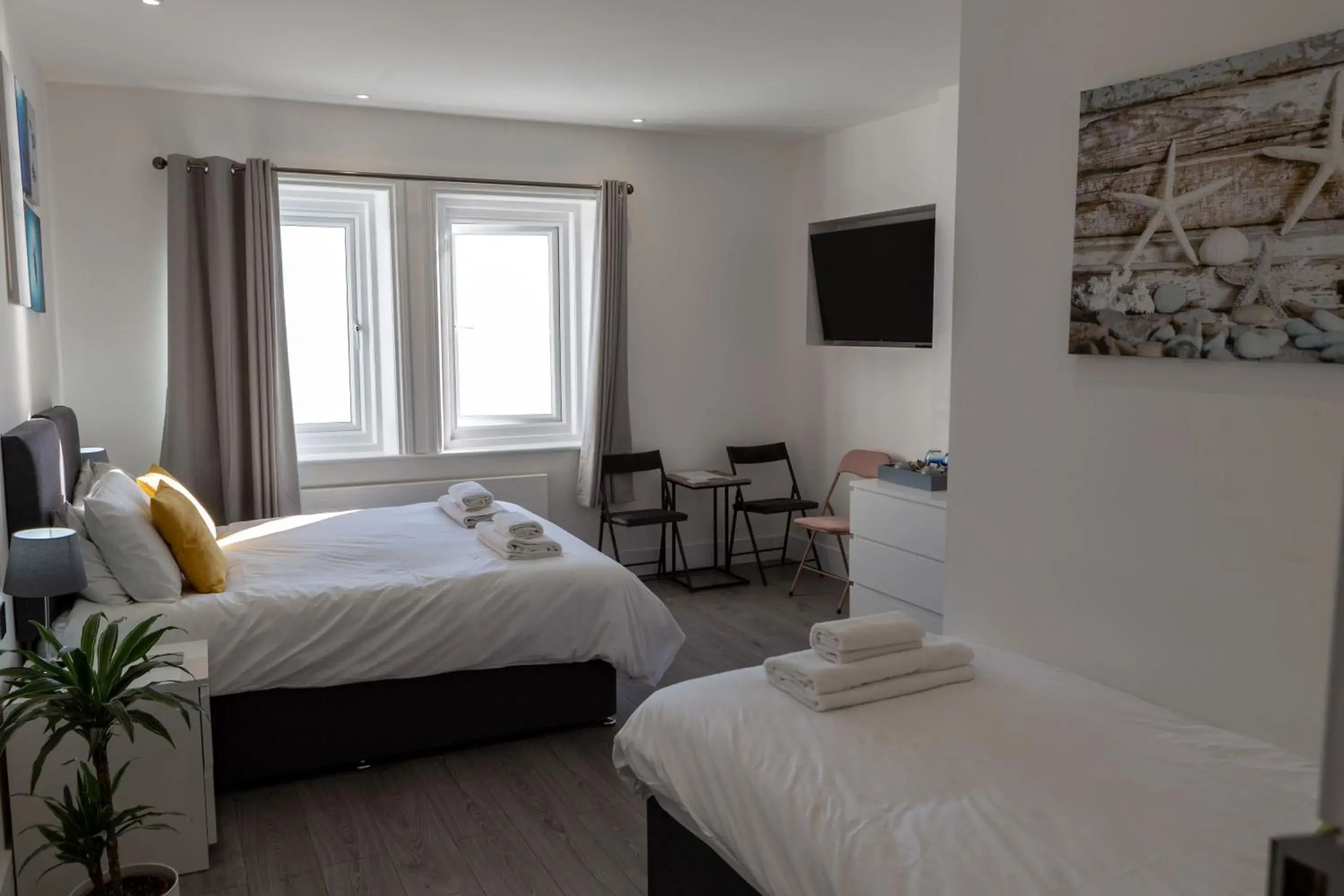 Deluxe Triple Room with Sea View in The Halcyon Deluxe Triple Room with Sea View in The Halcyon