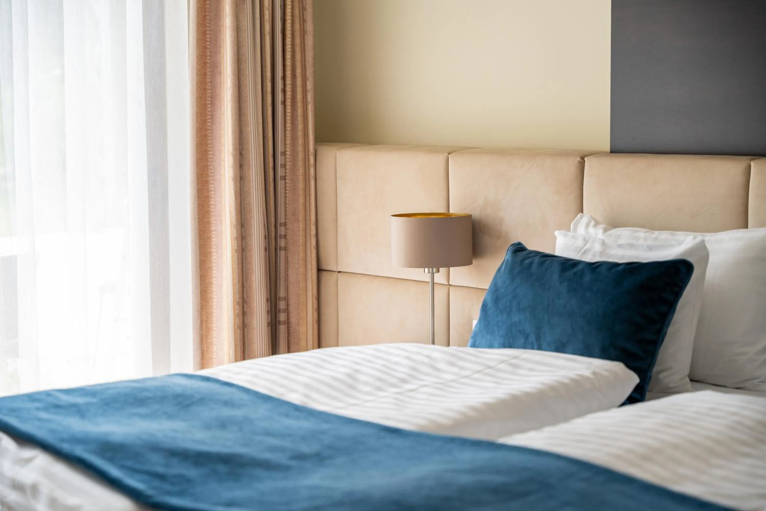 Bed in Fagus Hotel Conference & Spa