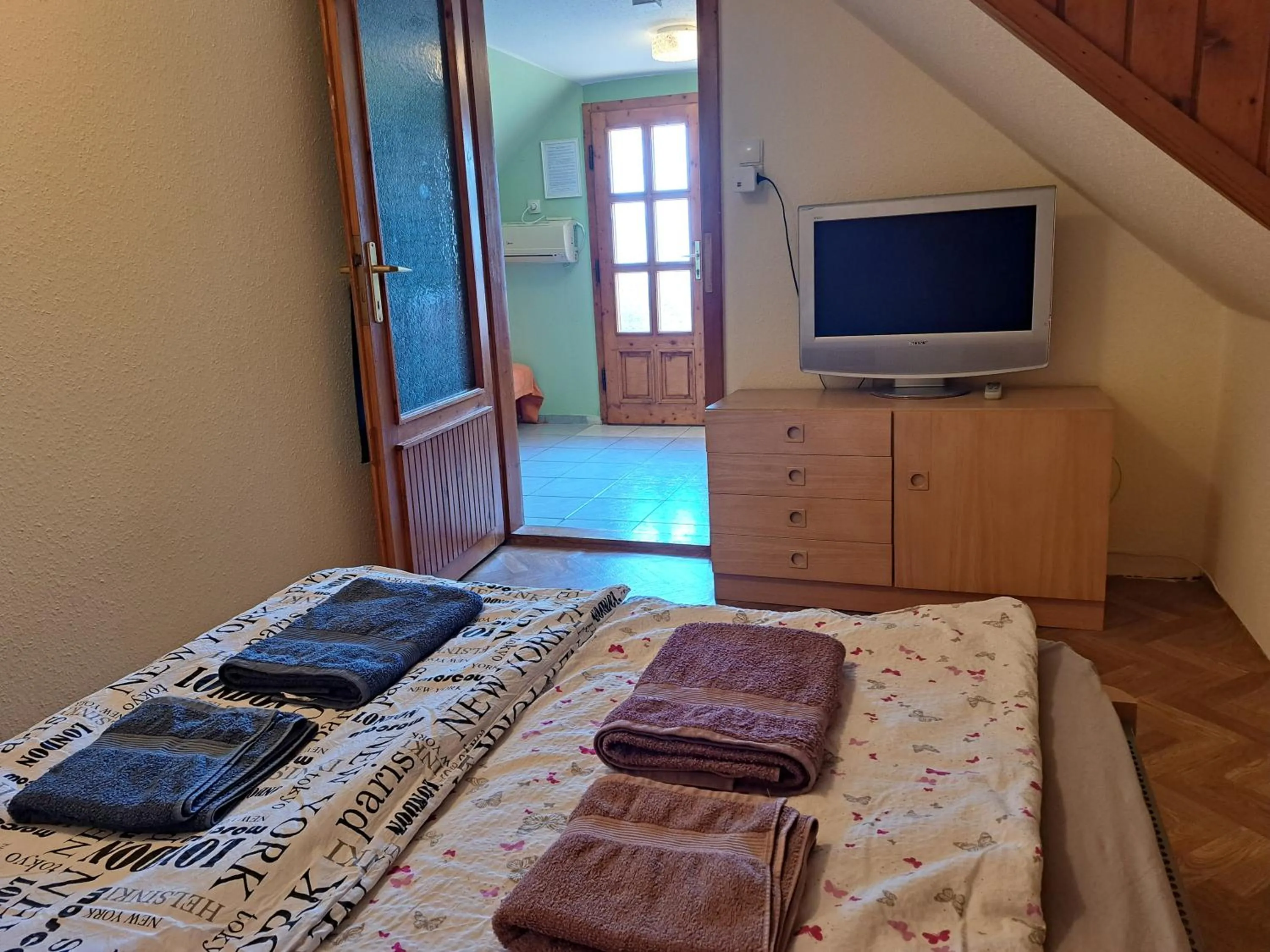 Bedroom, Bed in Pink Tulip Apartment House