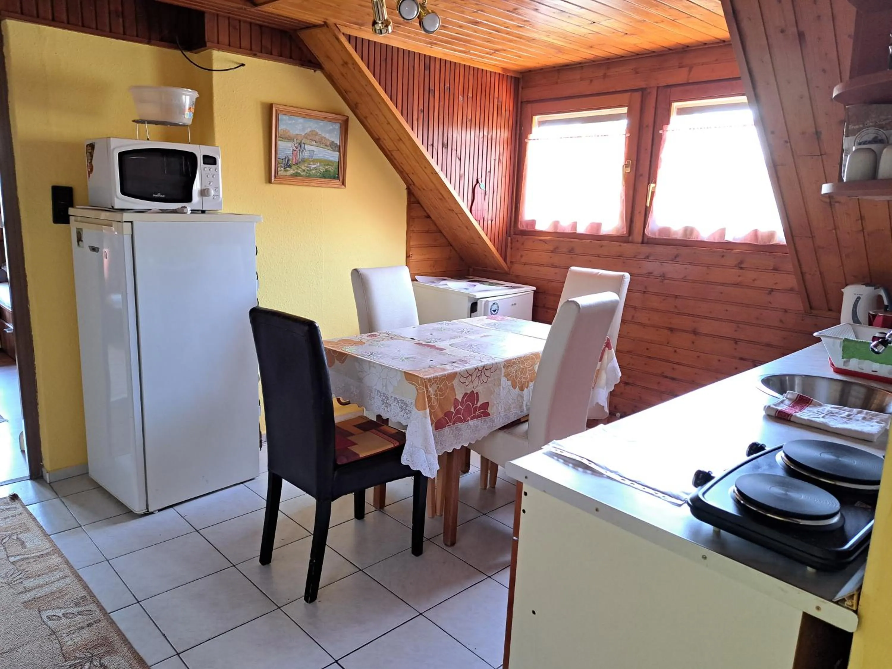 Dining area in Pink Tulip Apartment House