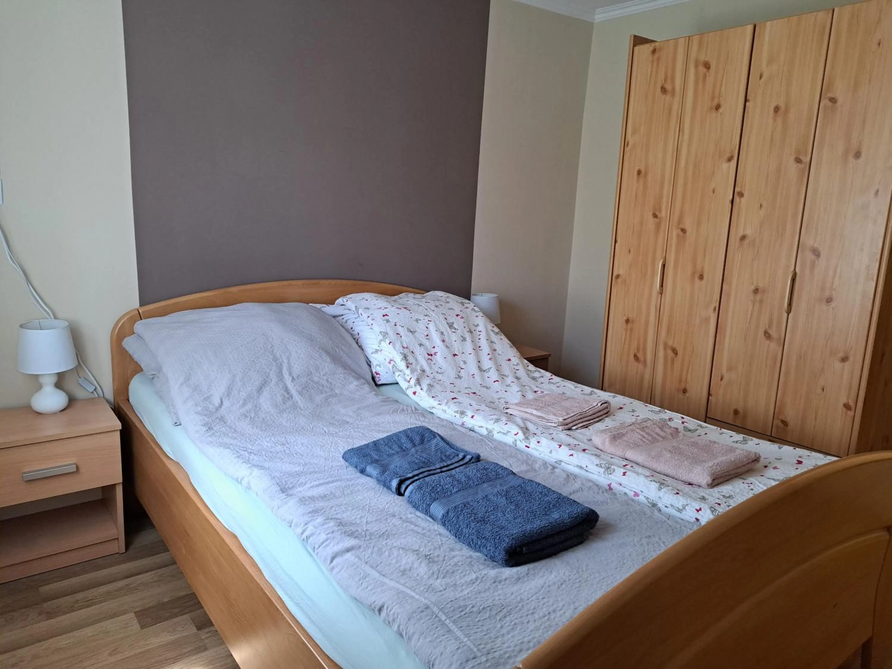 Bedroom, Bed in Pink Tulip Apartment House