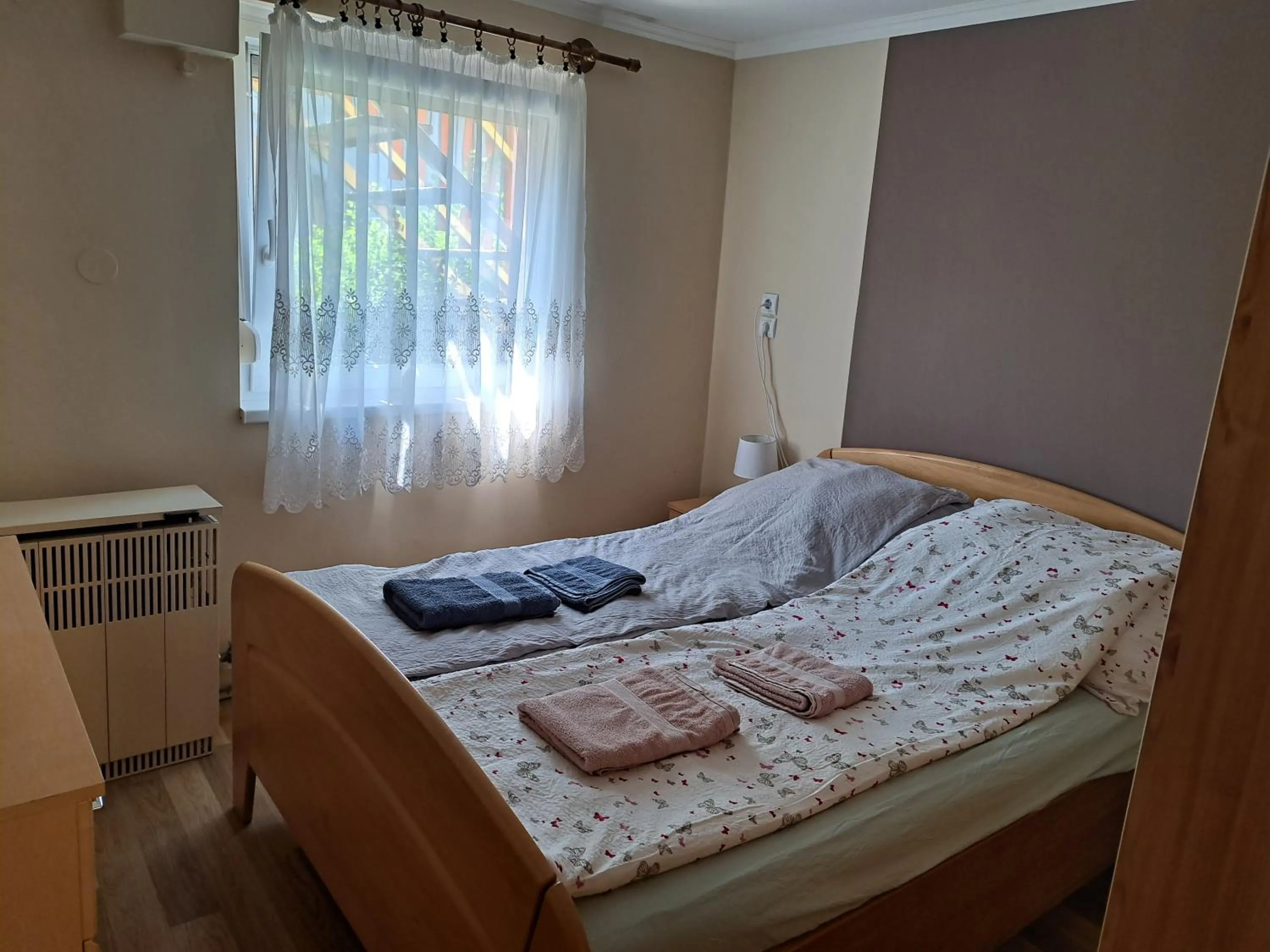 Bedroom, Bed in Pink Tulip Apartment House